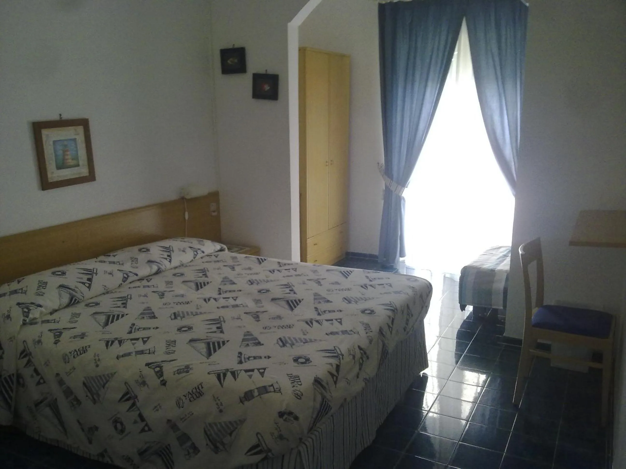 Bedroom in Hotel La Baia