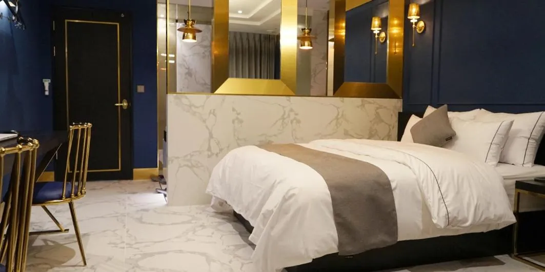 Bed in Astro Hotel
