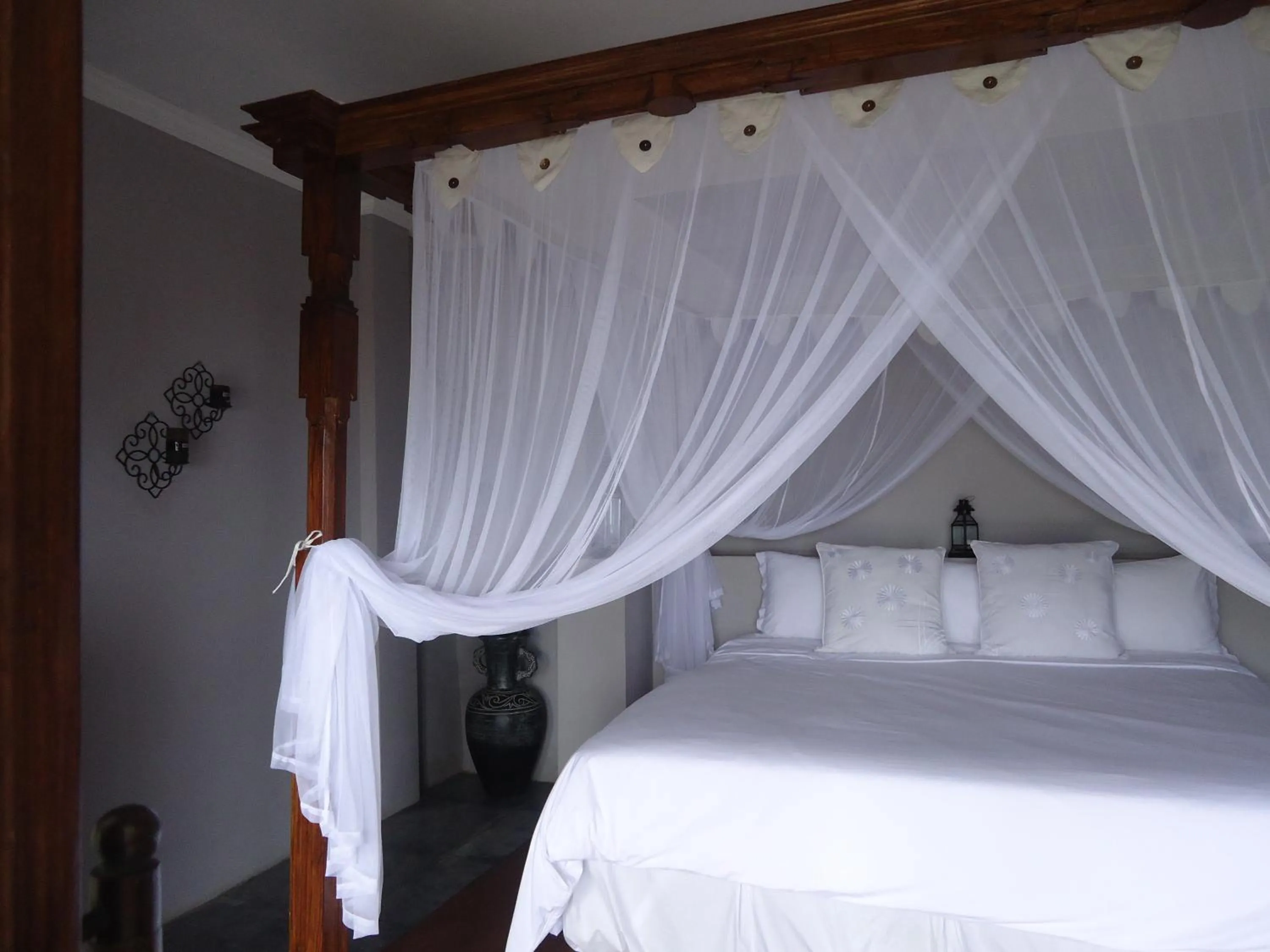 Bed in Baliku Dive Resort