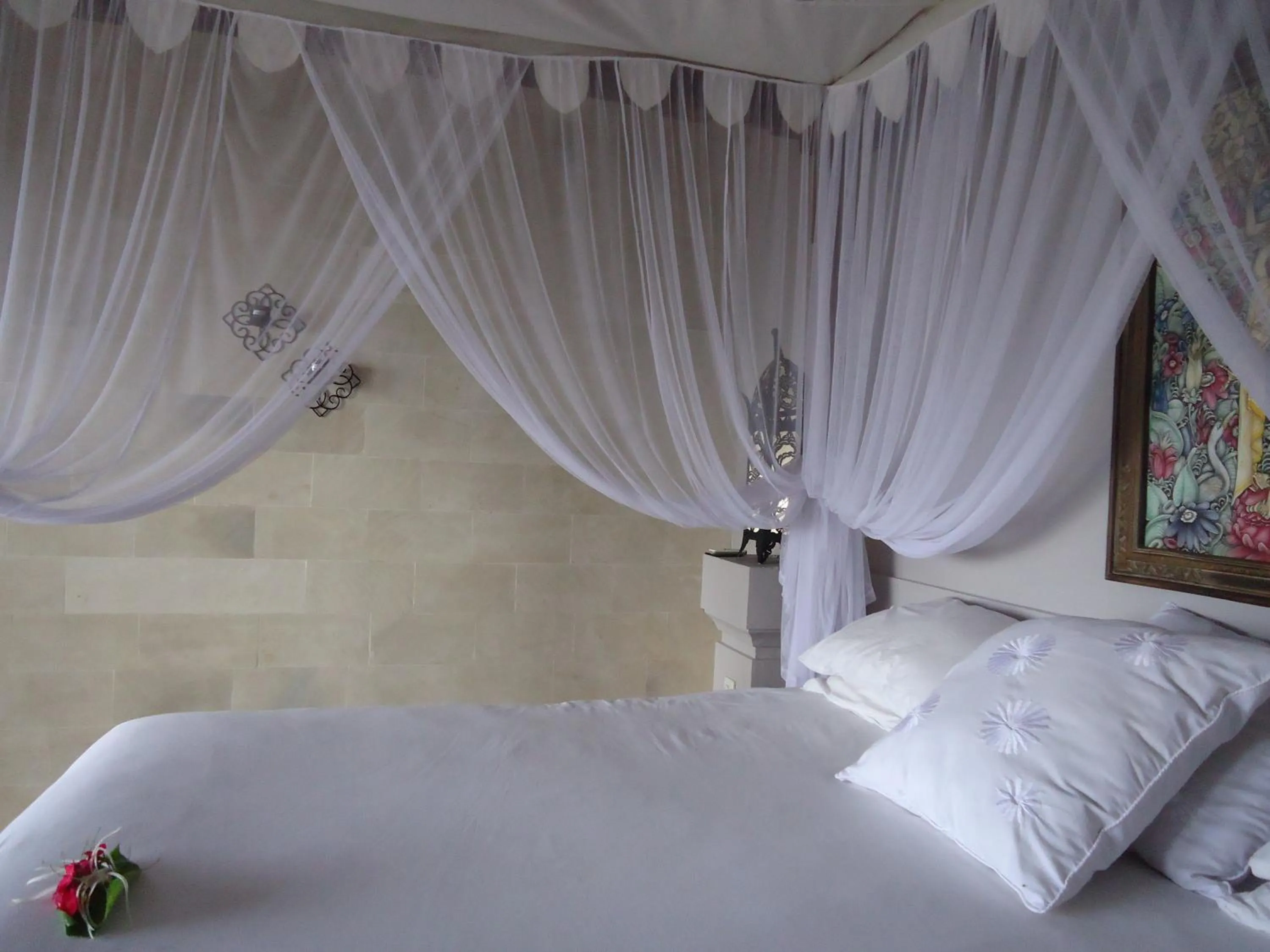 Bed in Baliku Dive Resort