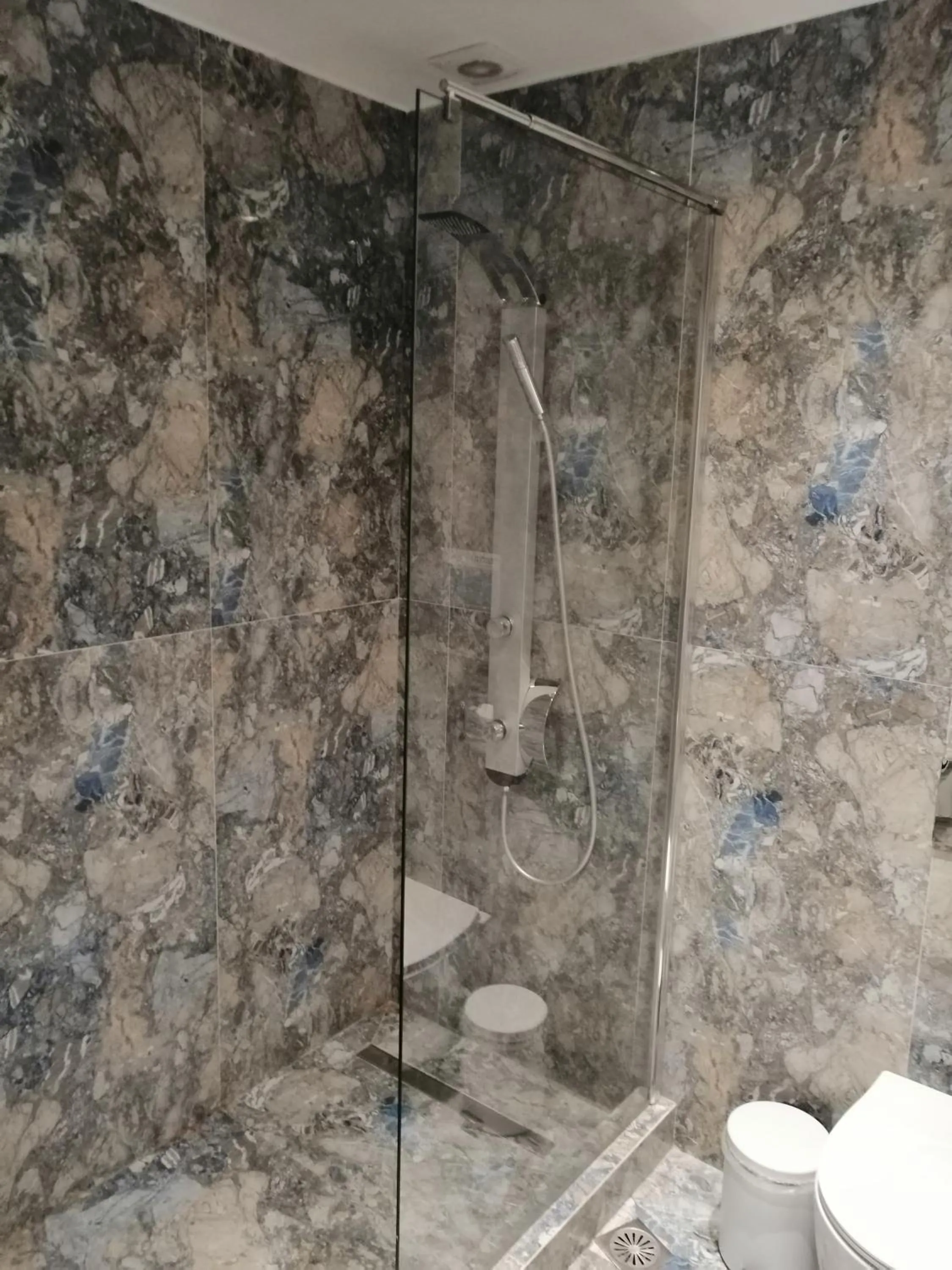 Shower in 24K Athena Suites