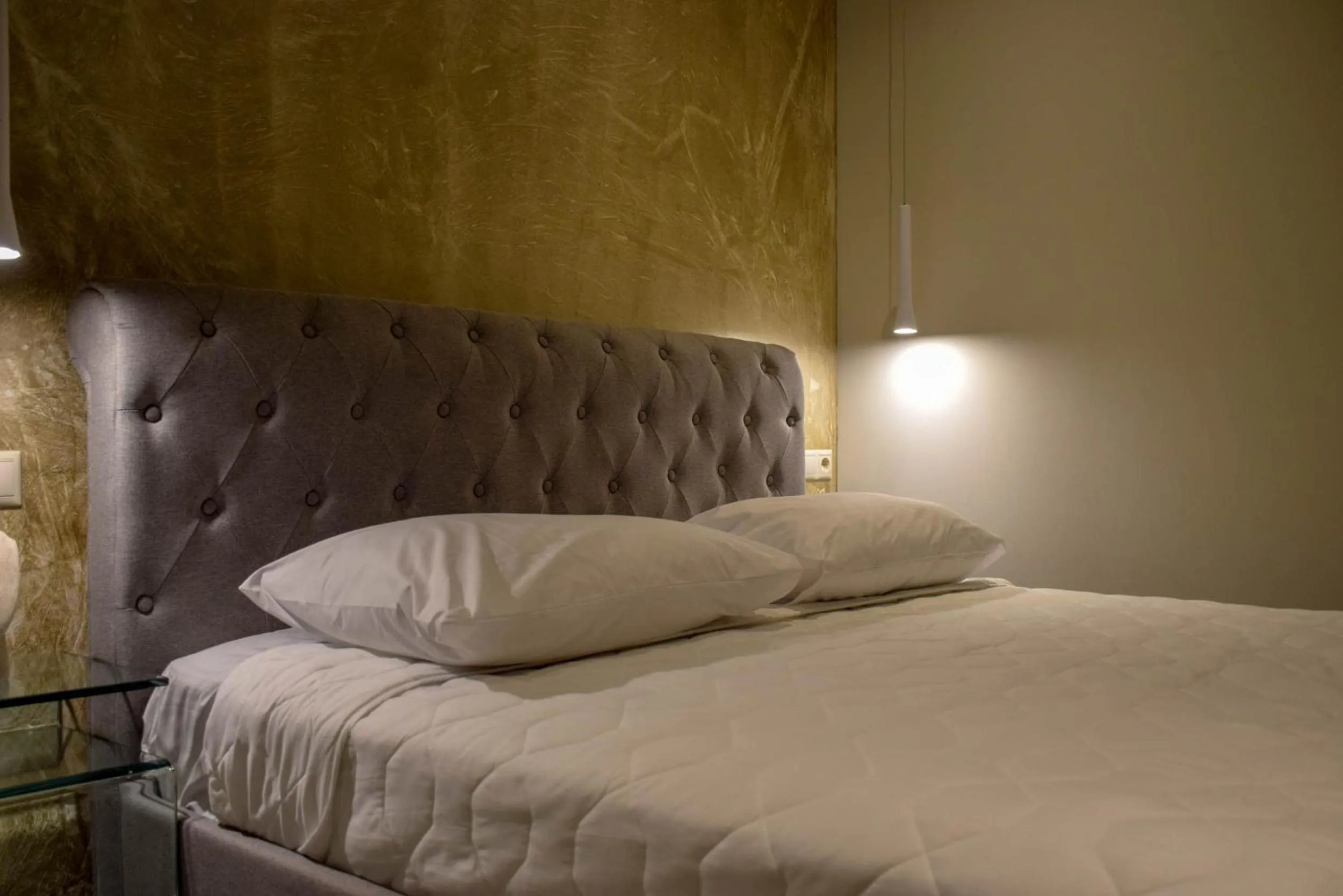 Bed in 24K Athena Suites