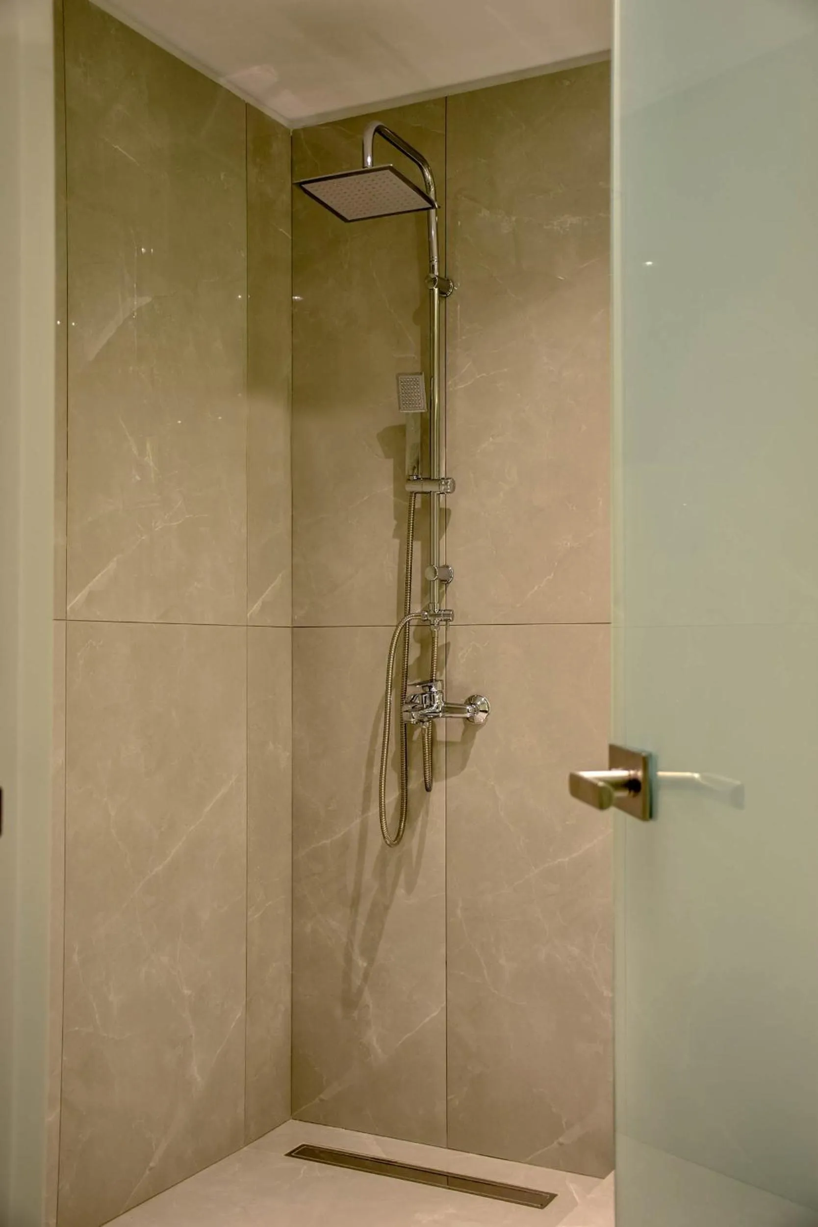 Shower in 24K Athena Suites