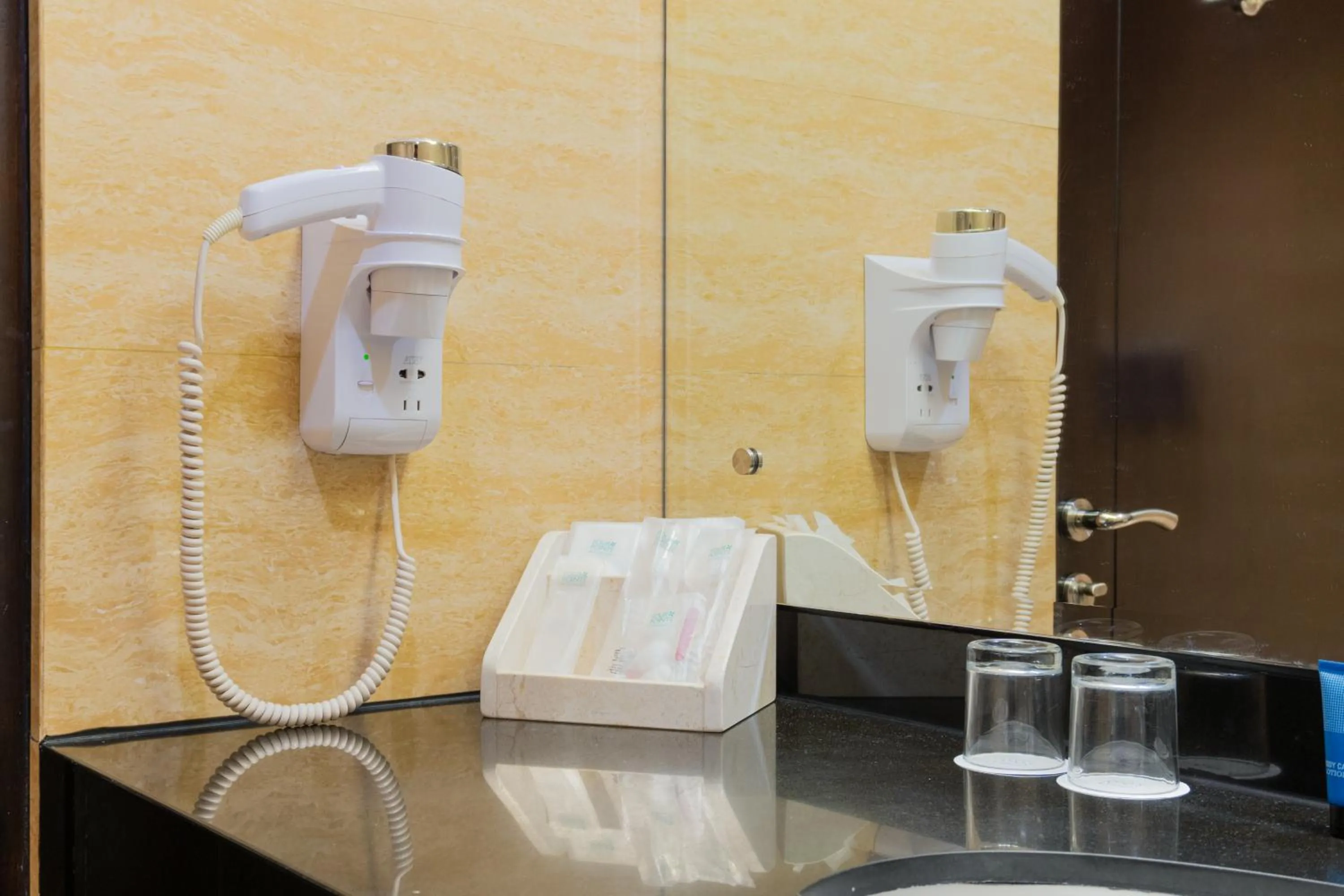 Toilet in Four Points by Sheraton Medan