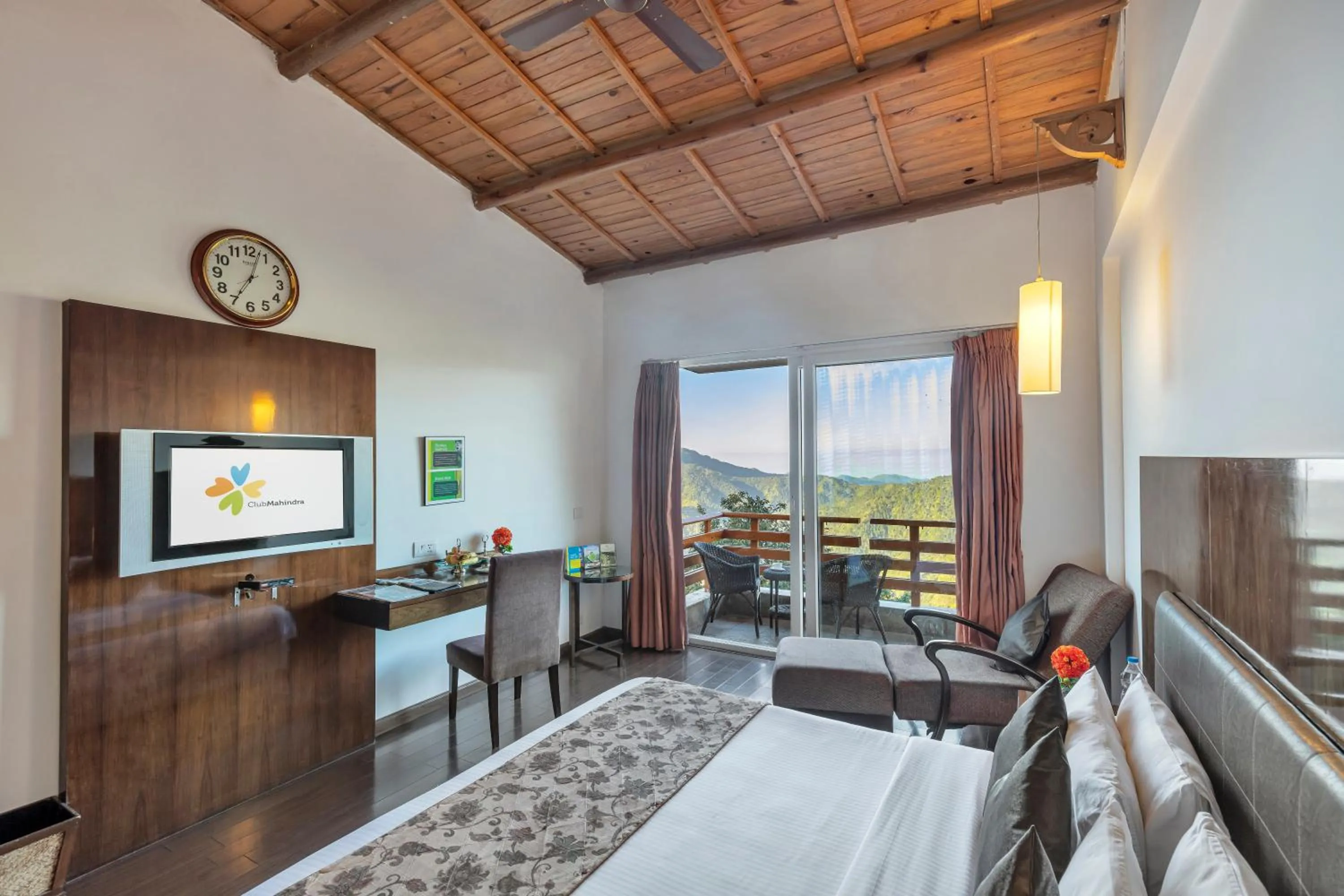 Living room, Bed in Club Mahindra Kanatal