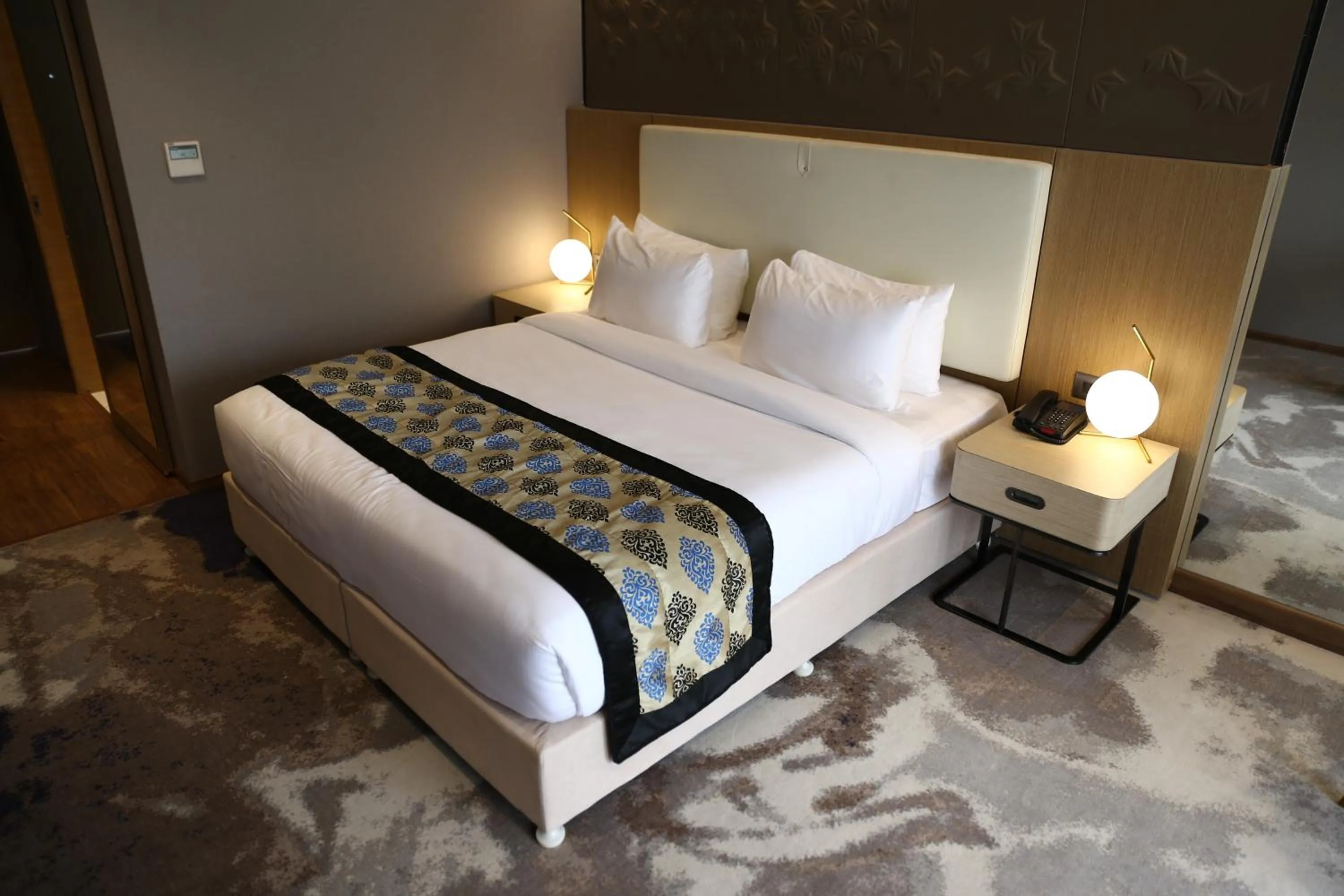 Bedroom in Clarks Inn Suites Raipur