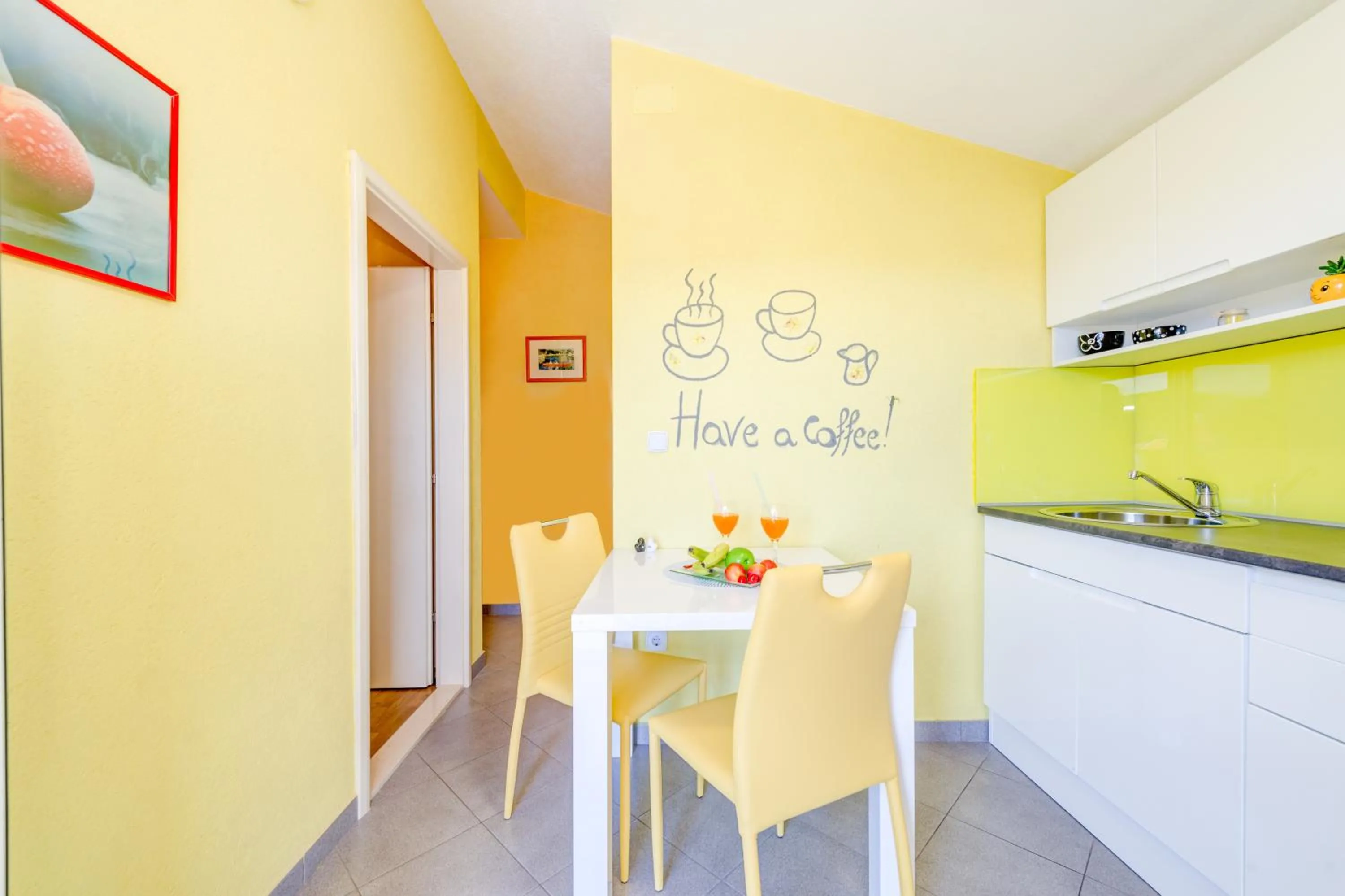 Kitchen or kitchenette in Apartments Petra