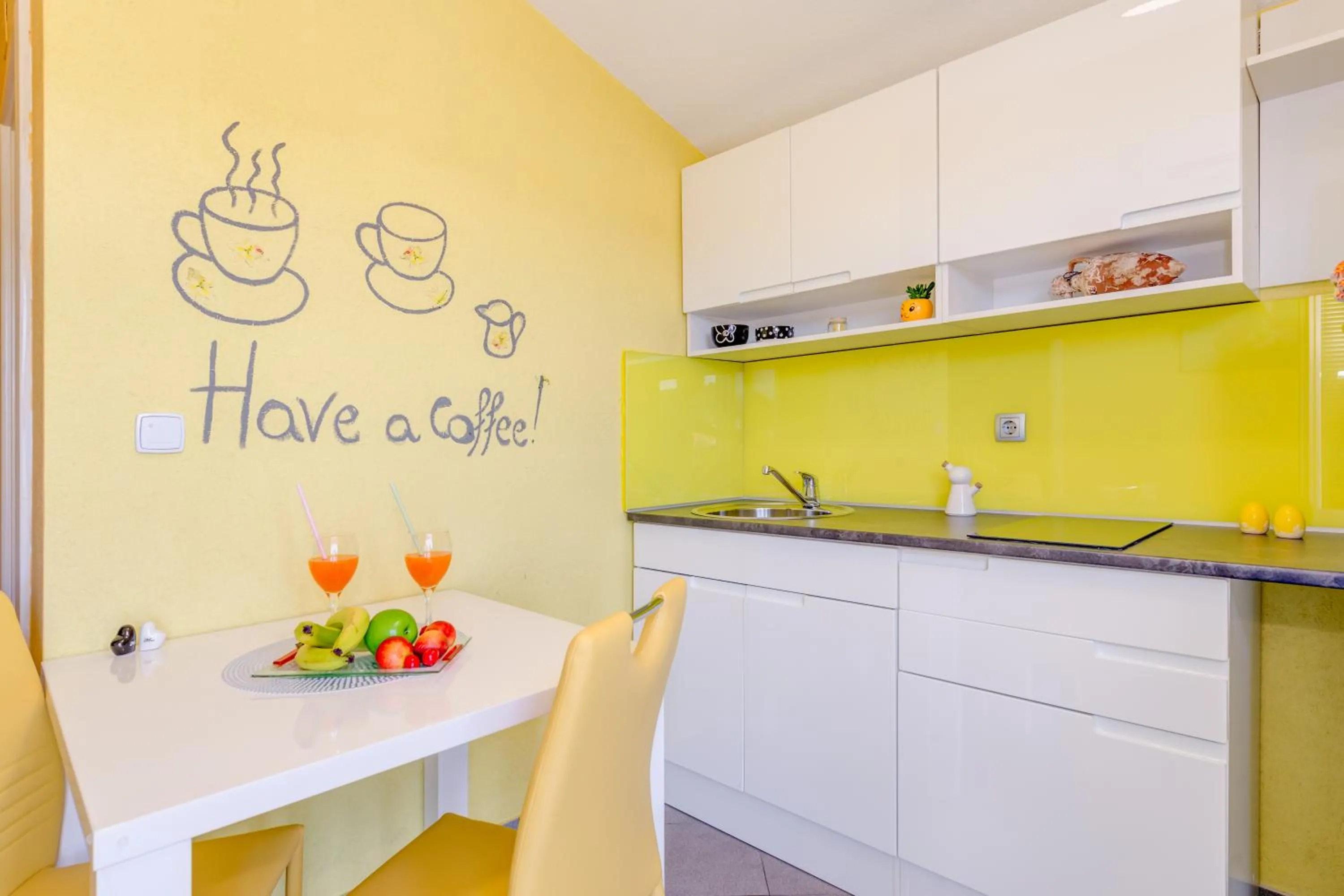 Kitchen or kitchenette in Apartments Petra