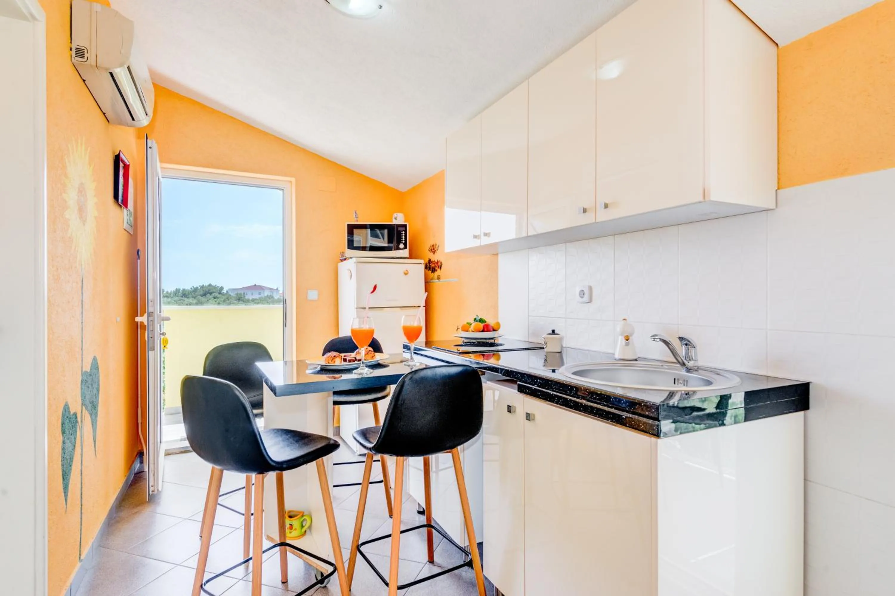 Kitchen or kitchenette in Apartments Petra