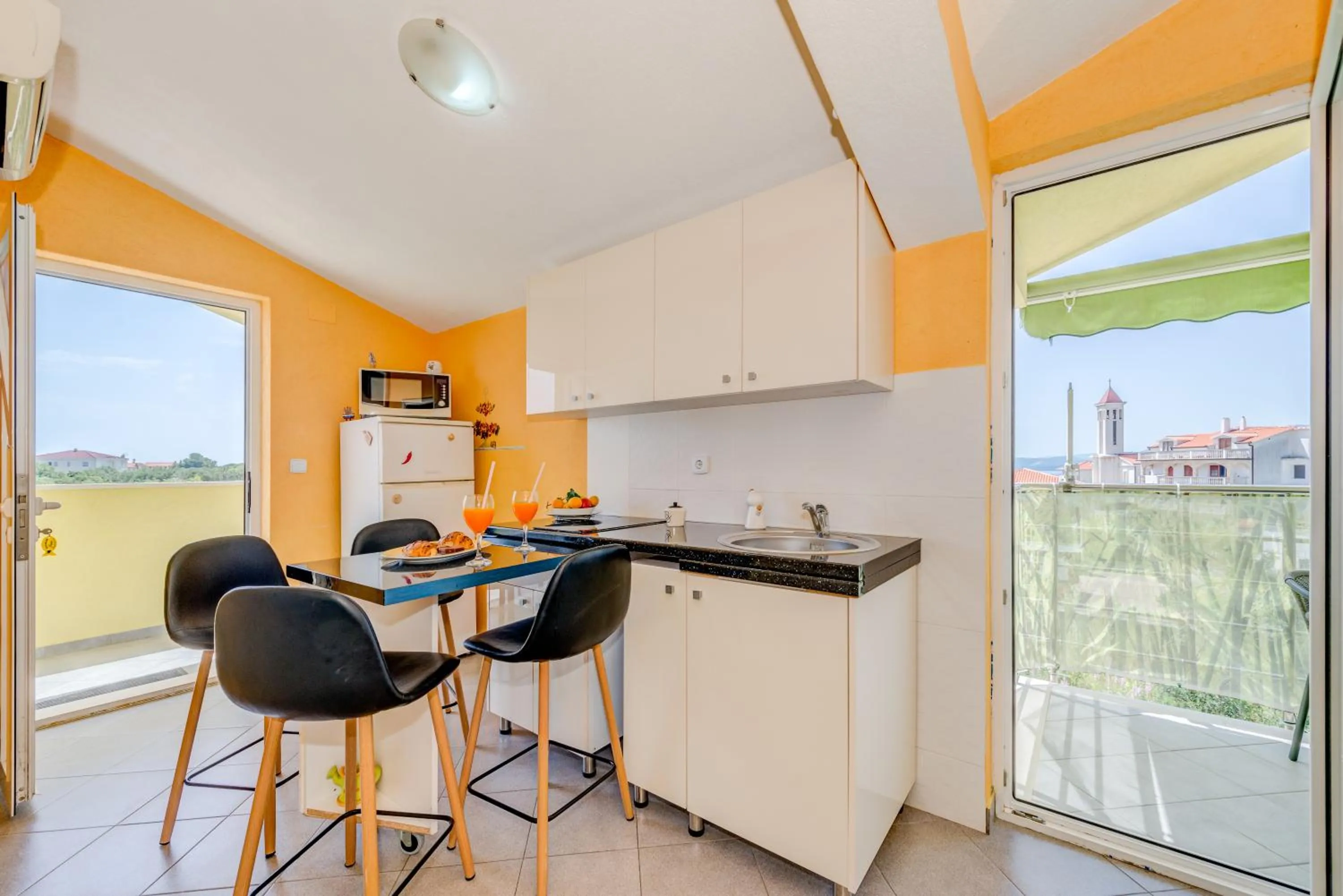Kitchen or kitchenette in Apartments Petra