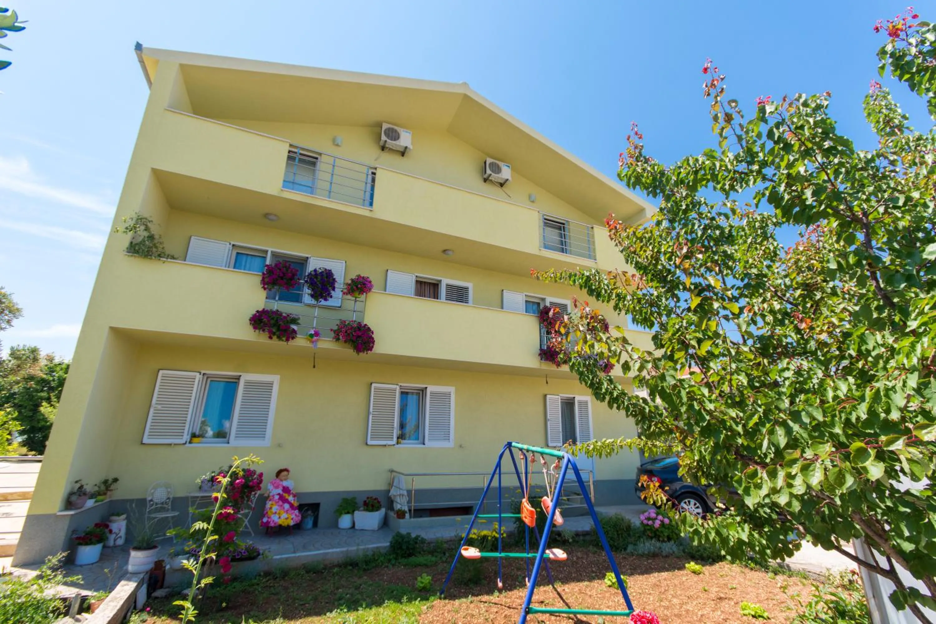 Property building in Apartments Petra