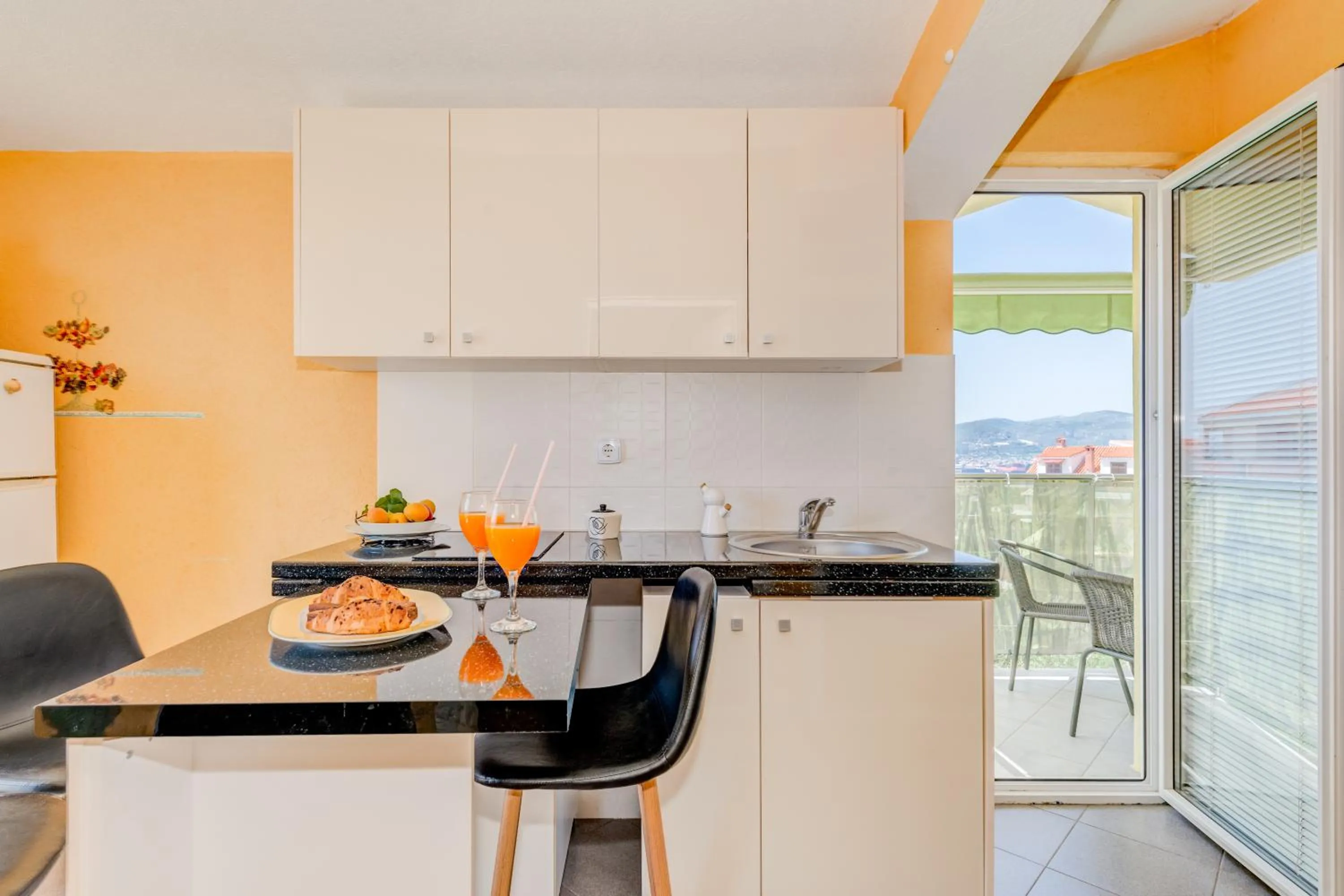 Kitchen or kitchenette in Apartments Petra
