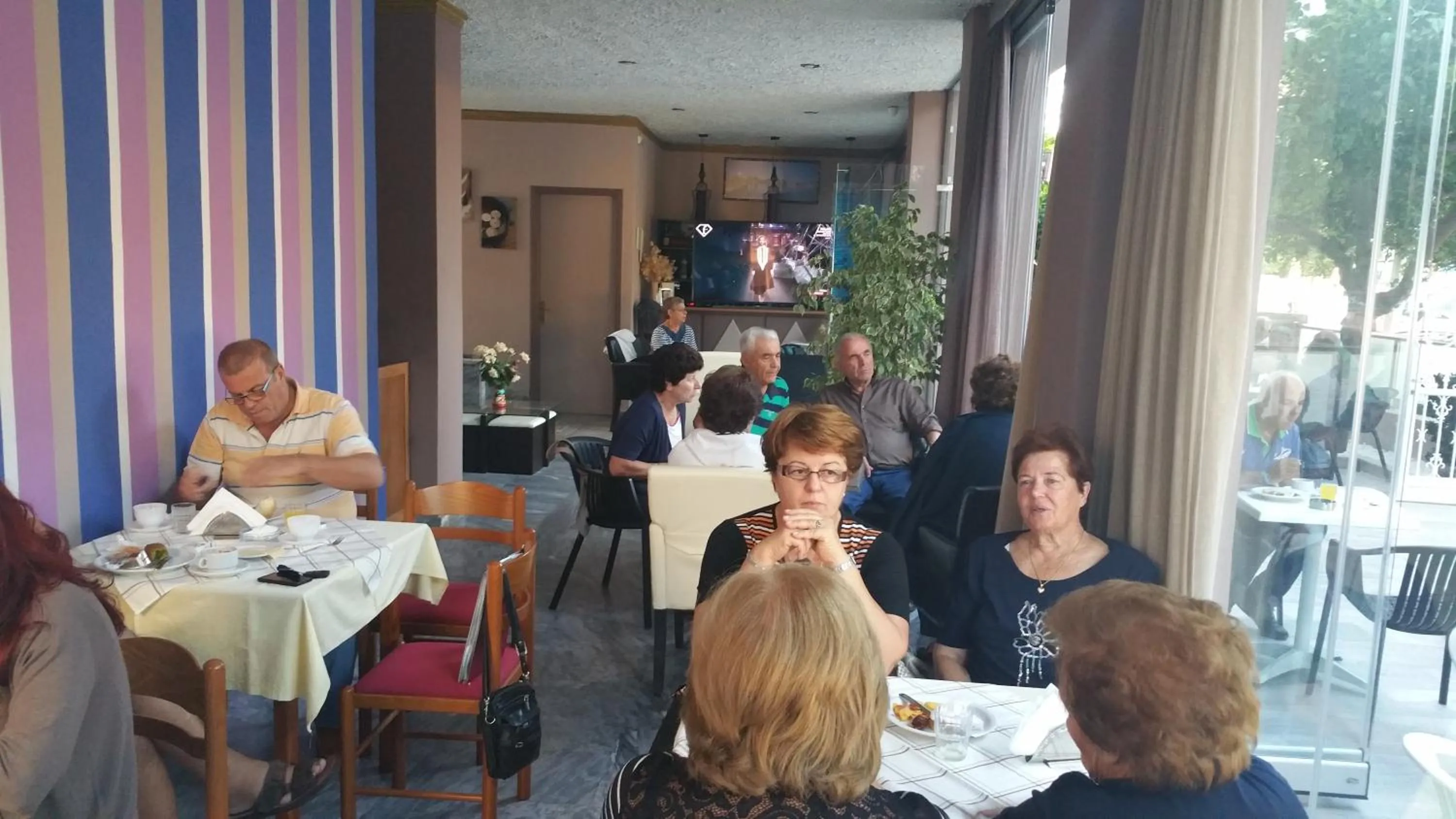 Lounge or bar in Olympia Hotel