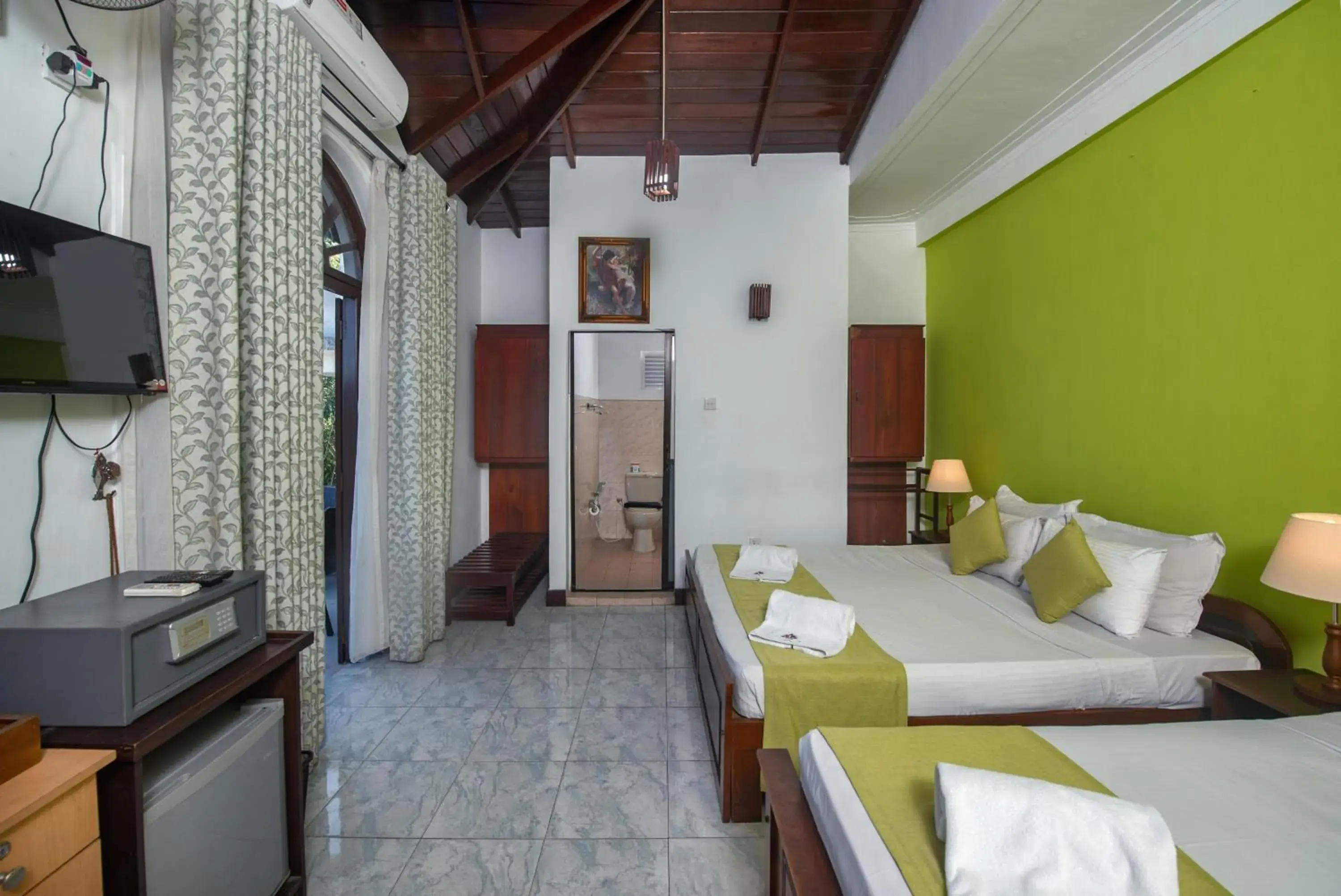 Family Room with Lake View - single occupancy in Ceyloni Lake Residency Family Room with Lake View - single occupancy in Ceyloni Lake Residency