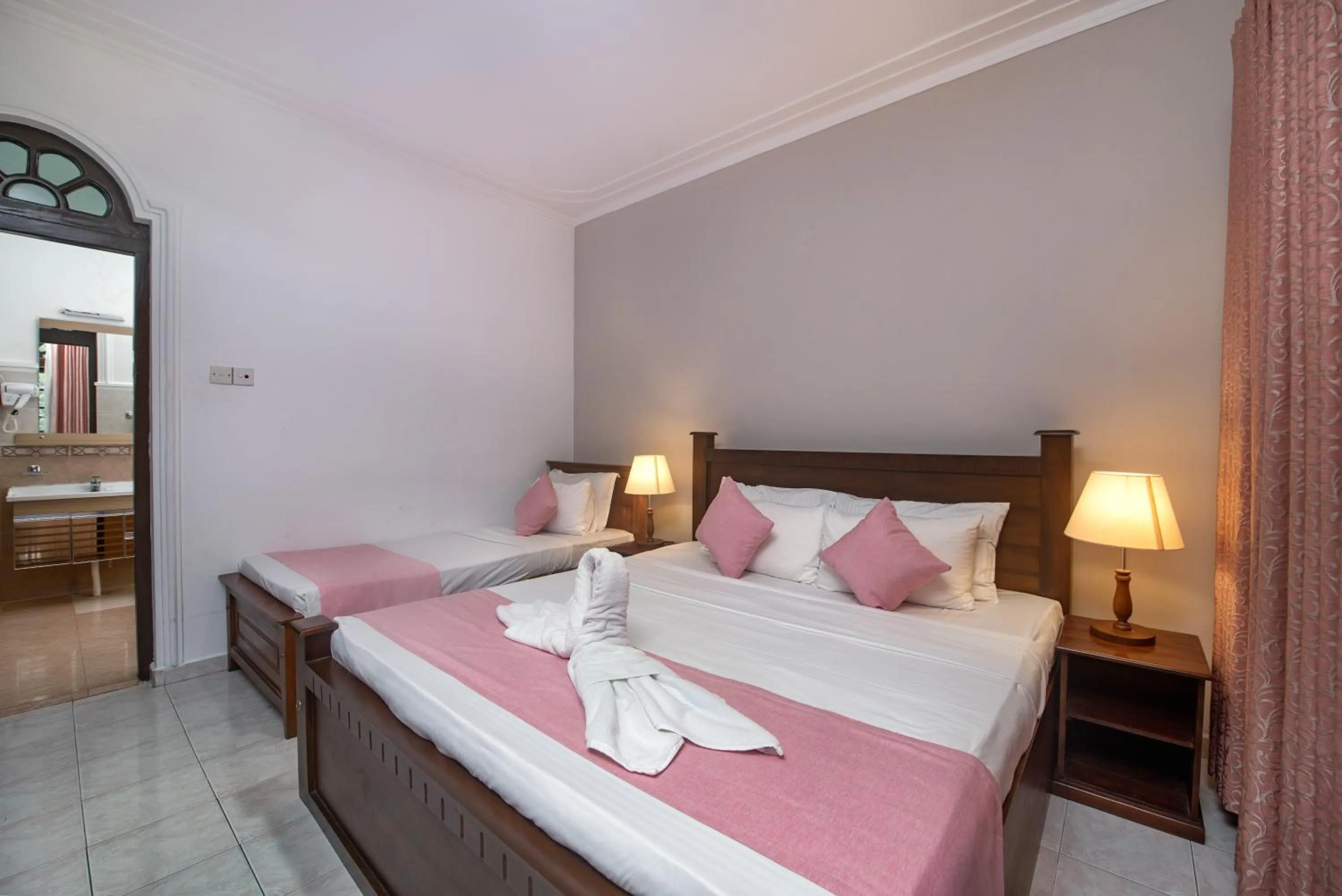 Bed in Ceyloni Lake Residency