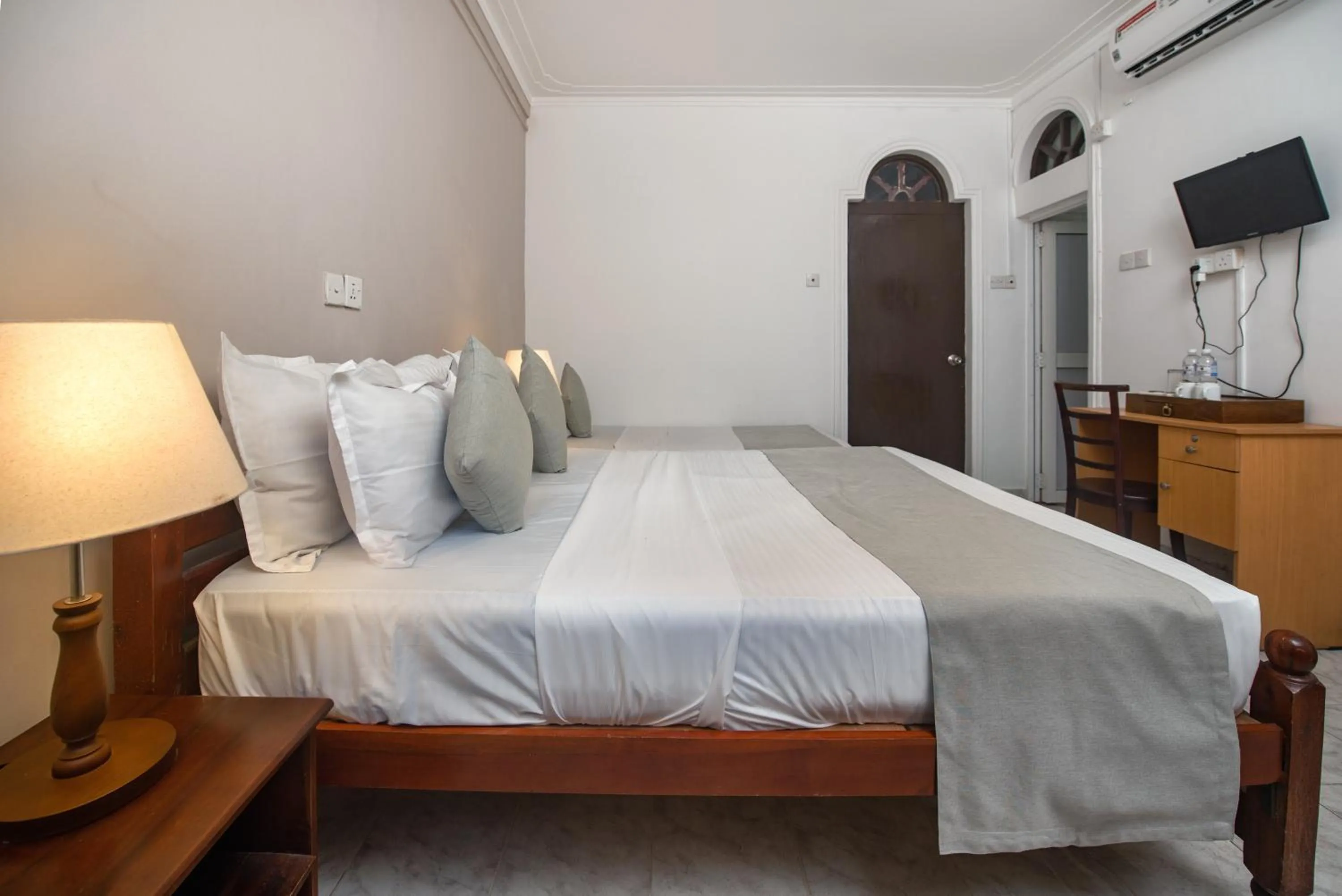 Bed in Ceyloni Lake Residency