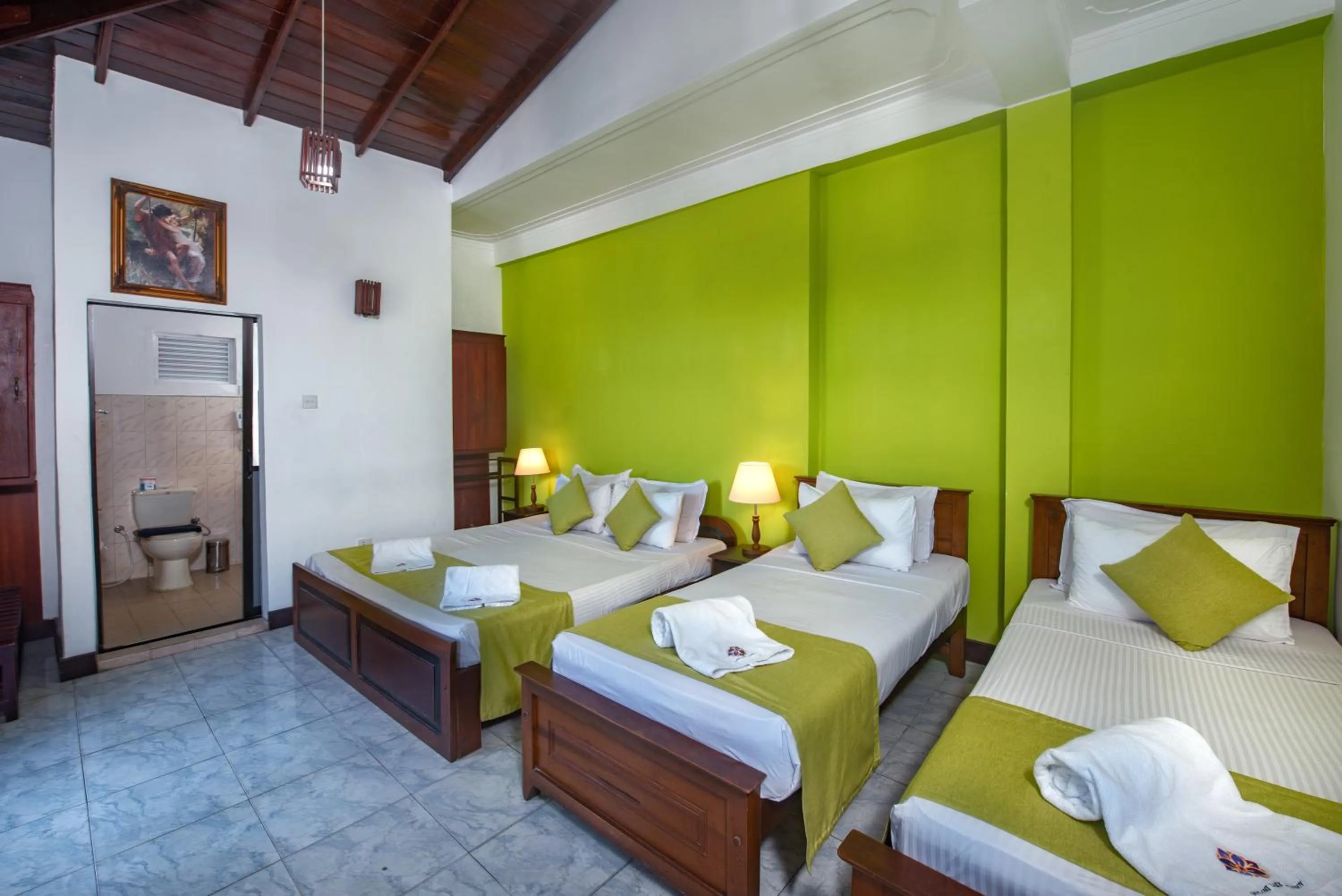 Bed in Ceyloni Lake Residency