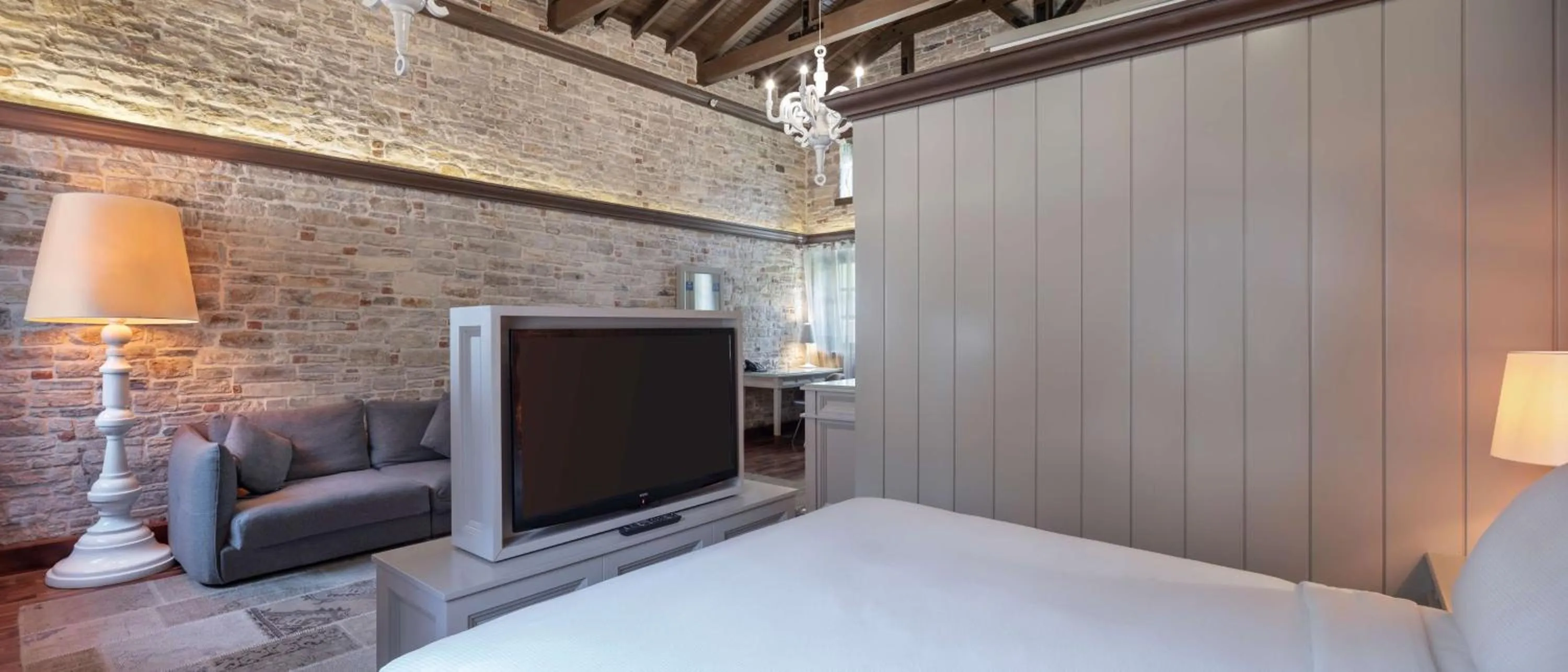 Living room, Bed in DoubleTree by Hilton Kusadasi