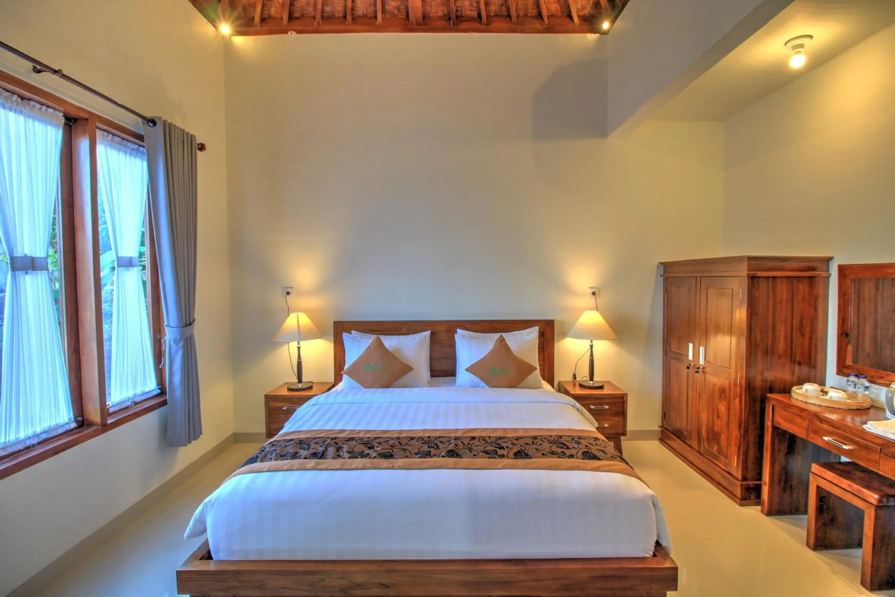 Bed in Arya Resort Nusa Penida