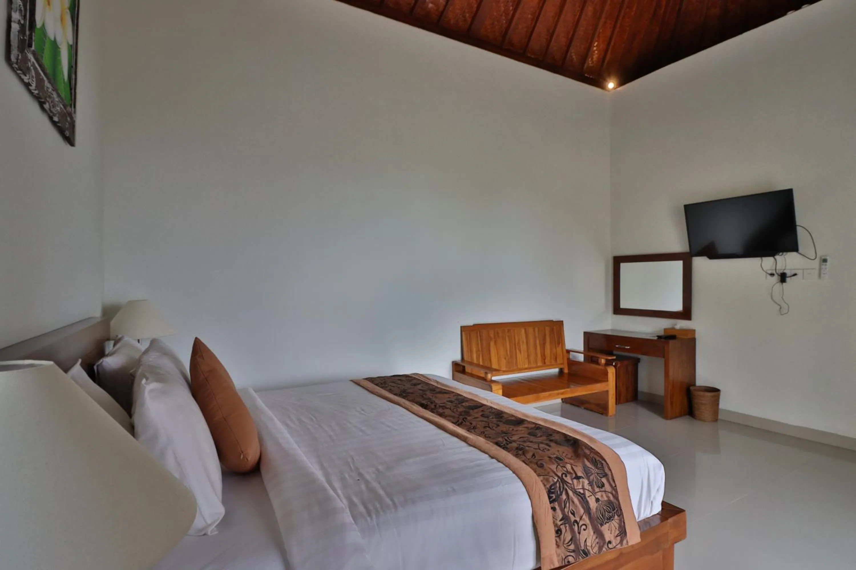 Bed in Arya Resort Nusa Penida