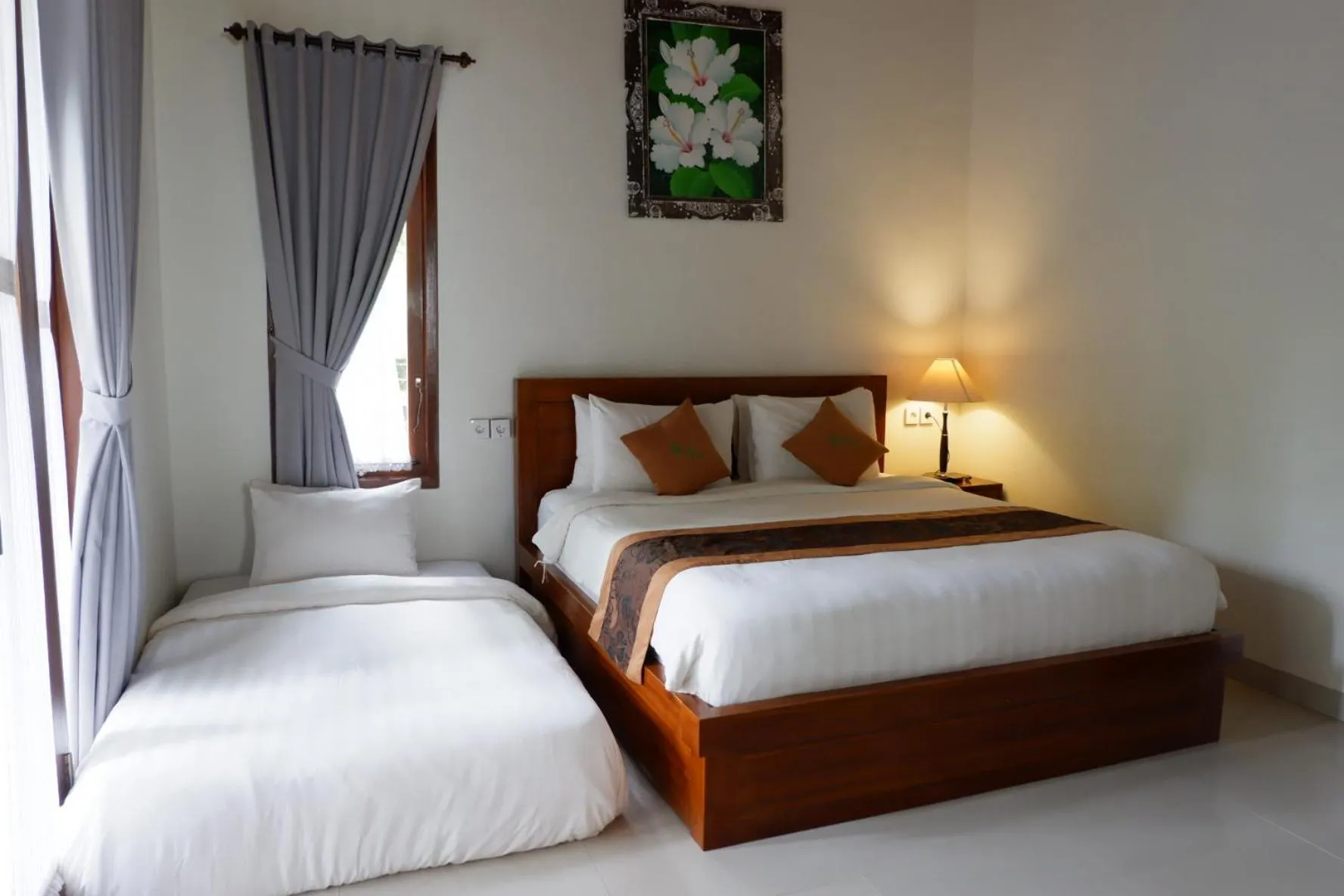 Bed in Arya Resort Nusa Penida