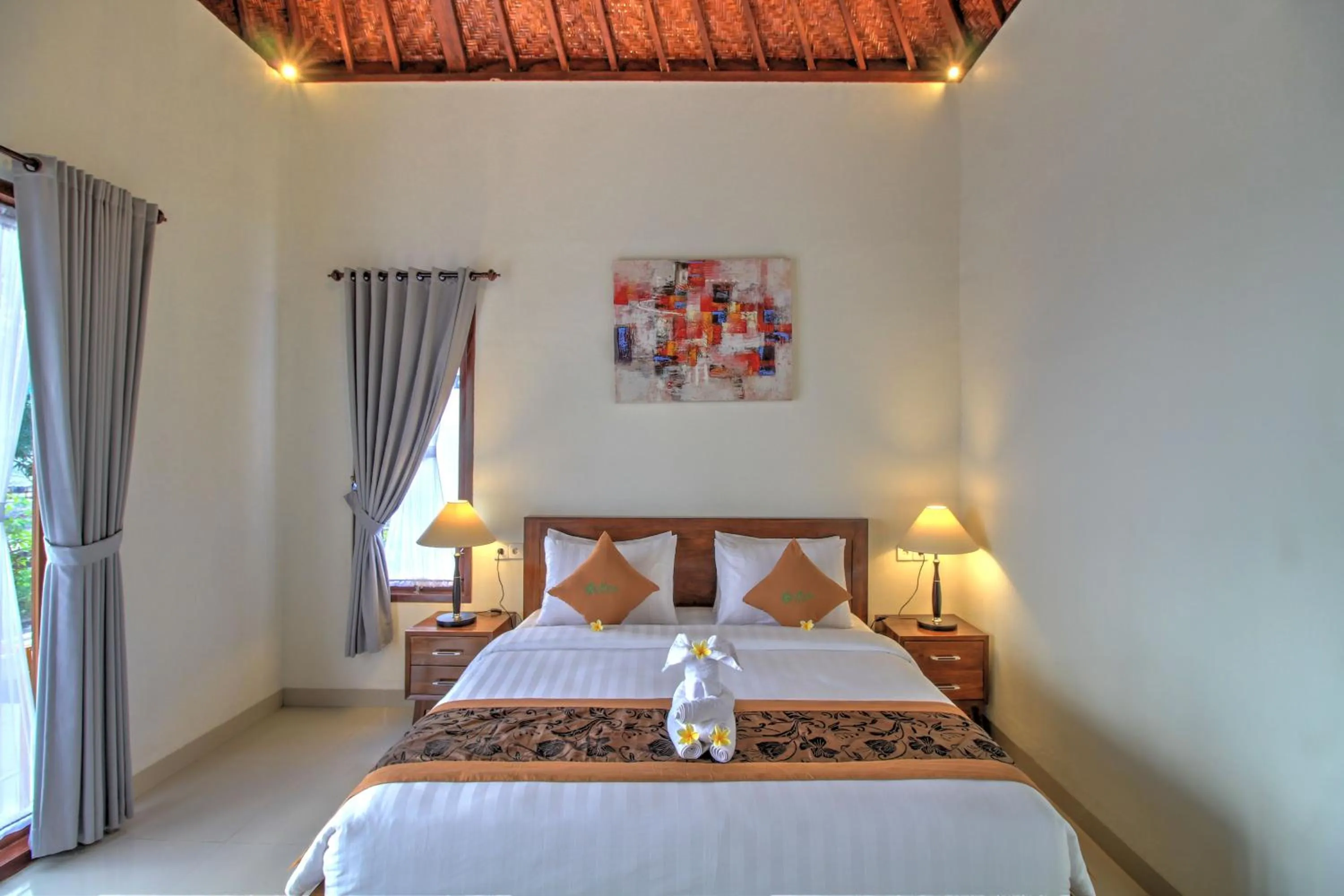 Bed in Arya Resort Nusa Penida