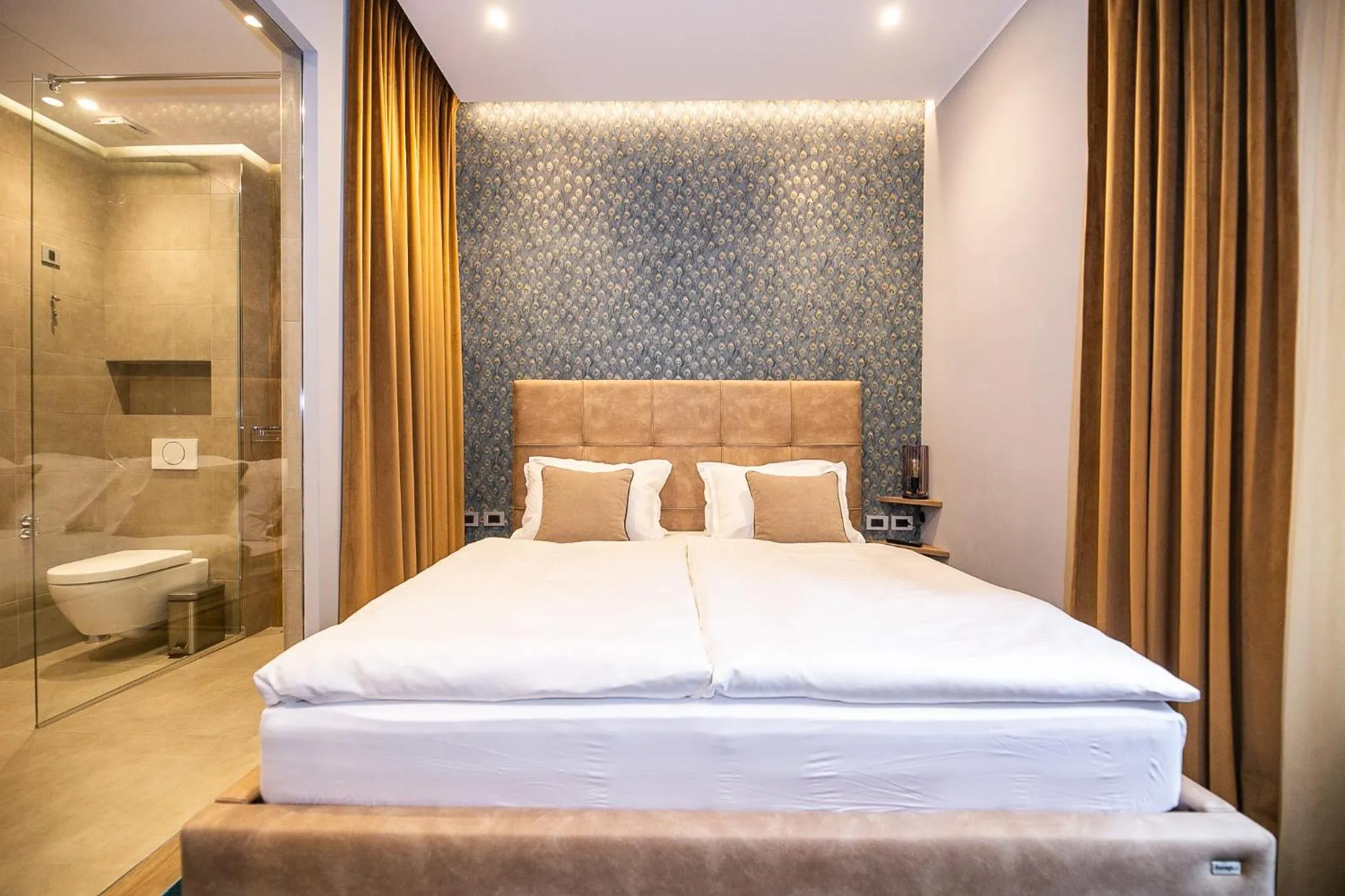 Bed in Teatro Suite & Rooms