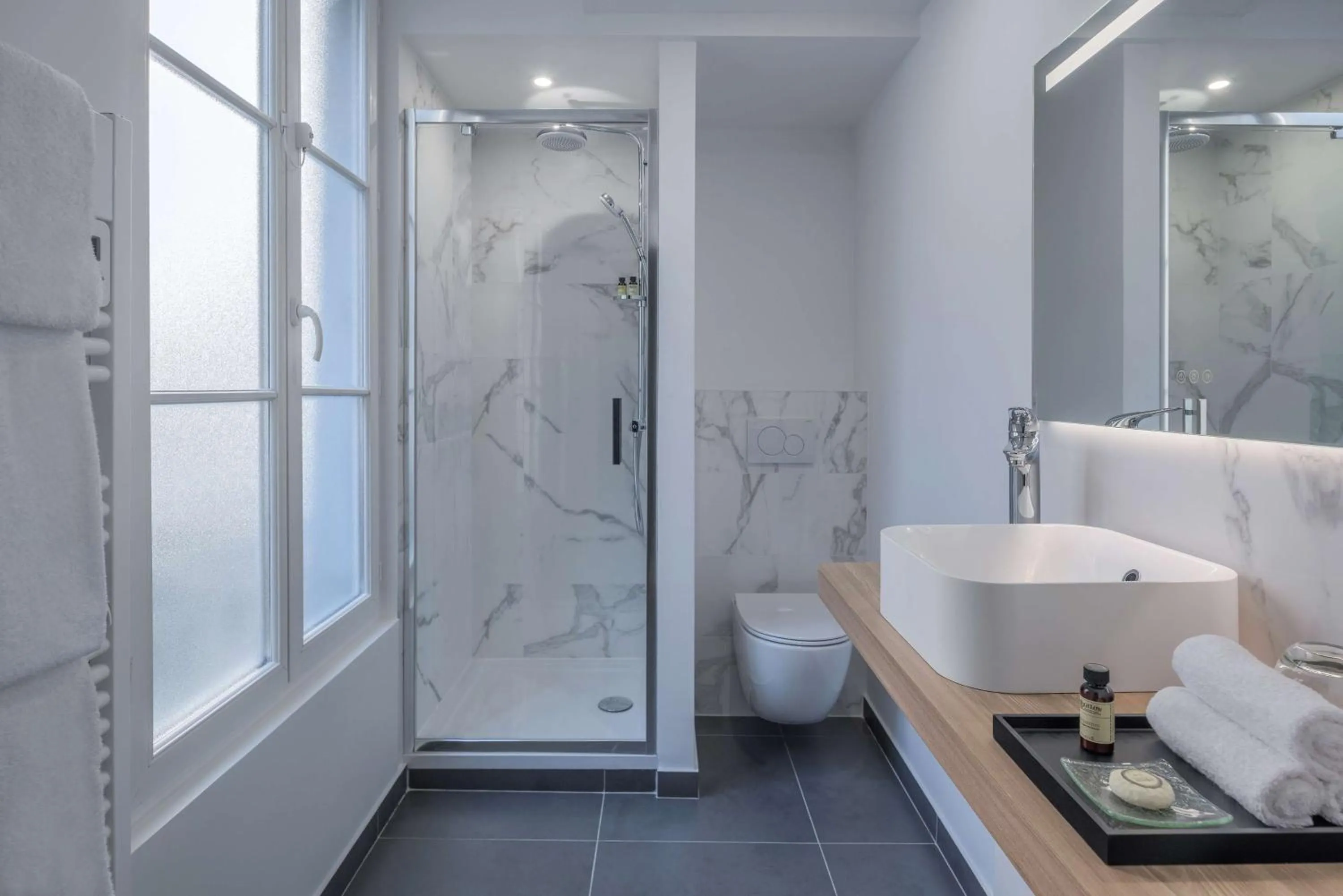 Toilet in Hotel Camille Paris Tapestry Collection by Hilton