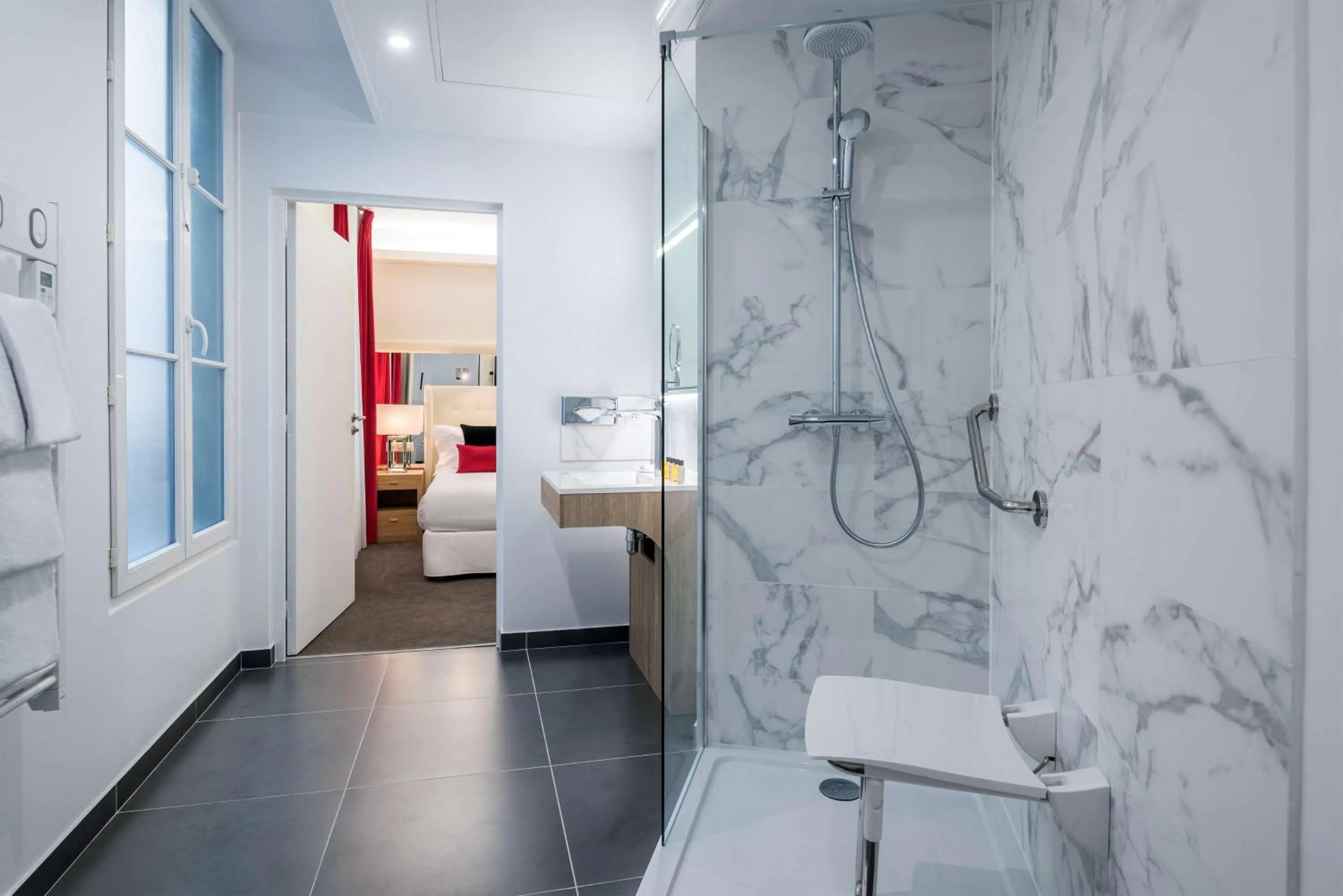 Bathroom in Hotel Camille Paris Tapestry Collection by Hilton