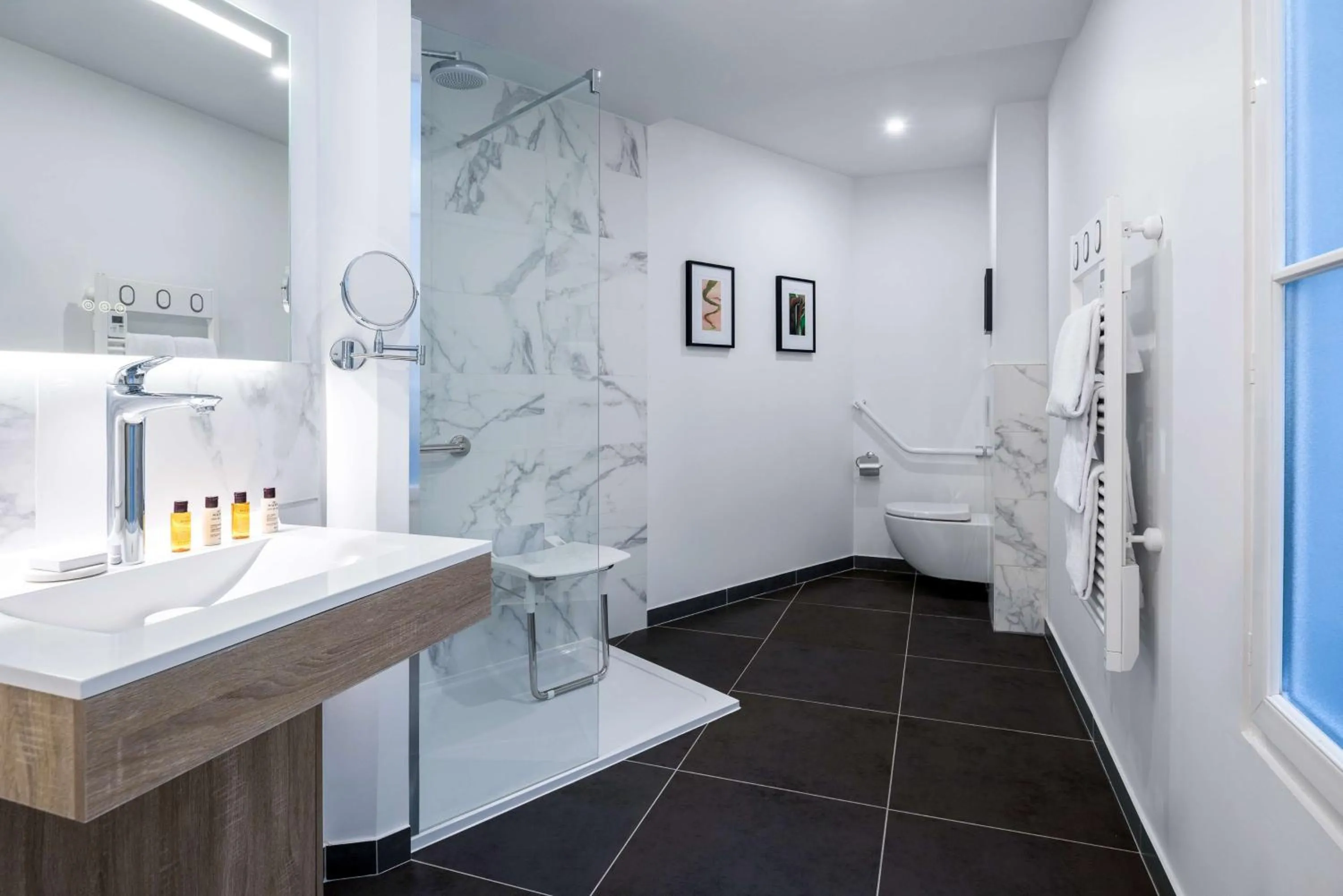 Bathroom in Hotel Camille Paris Tapestry Collection by Hilton