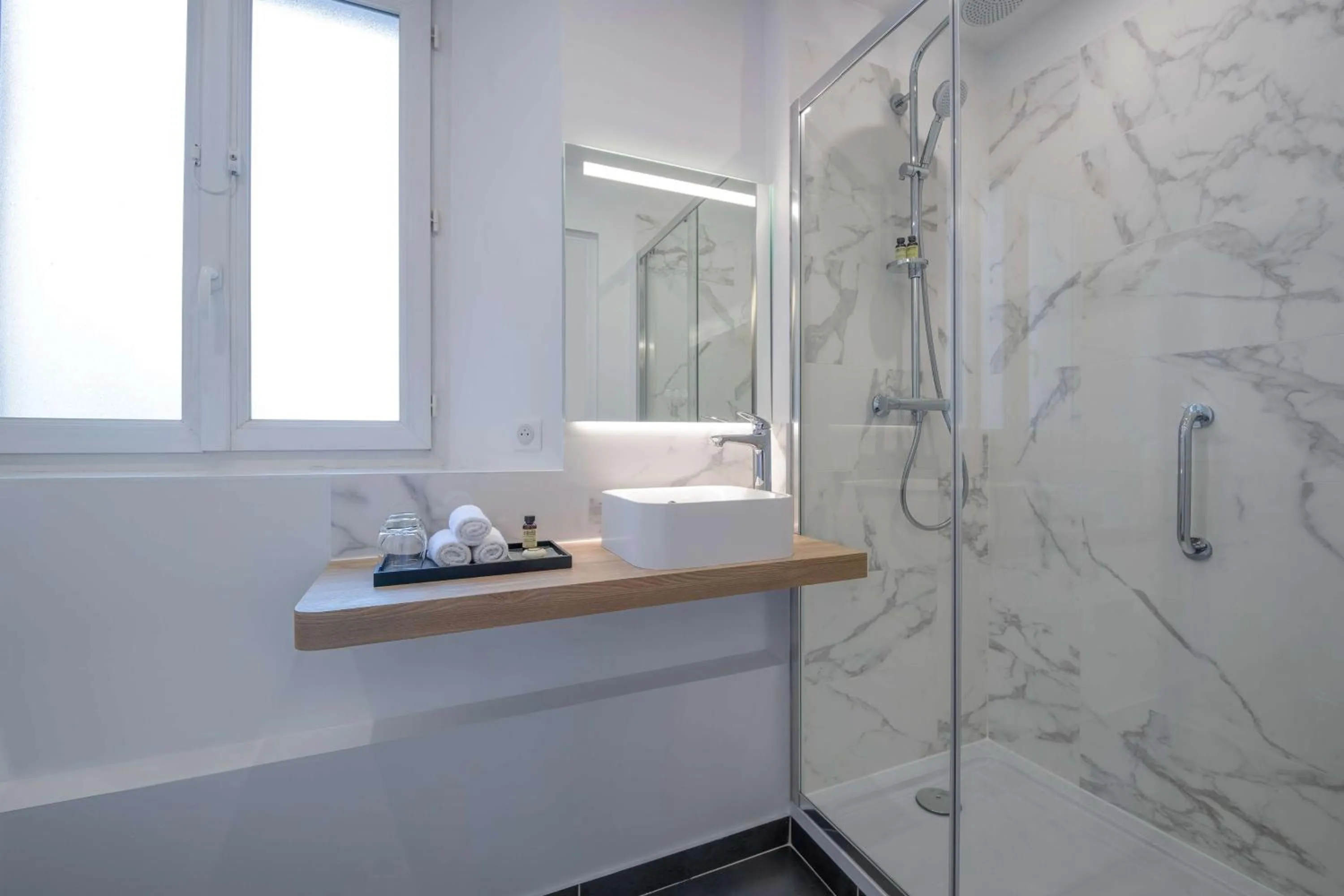 Toilet in Hotel Camille Paris Tapestry Collection by Hilton