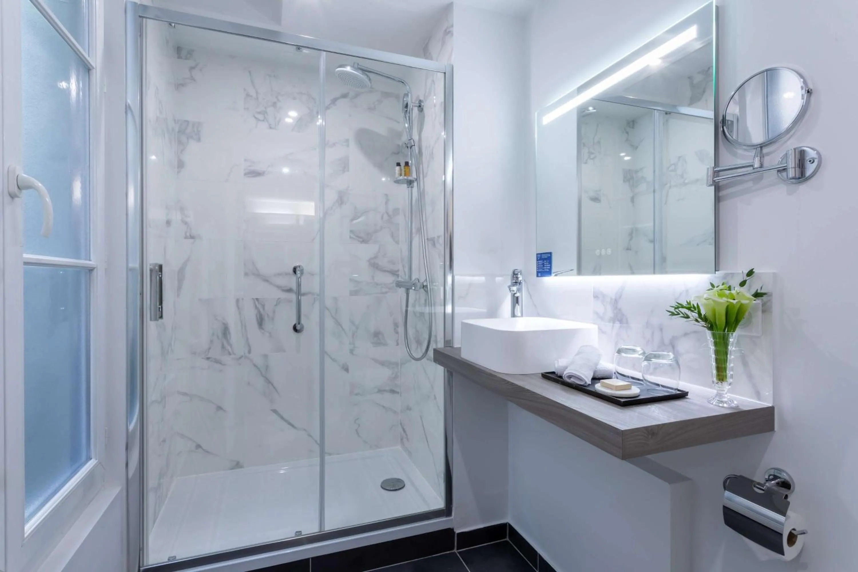 Bathroom in Hotel Camille Paris Tapestry Collection by Hilton