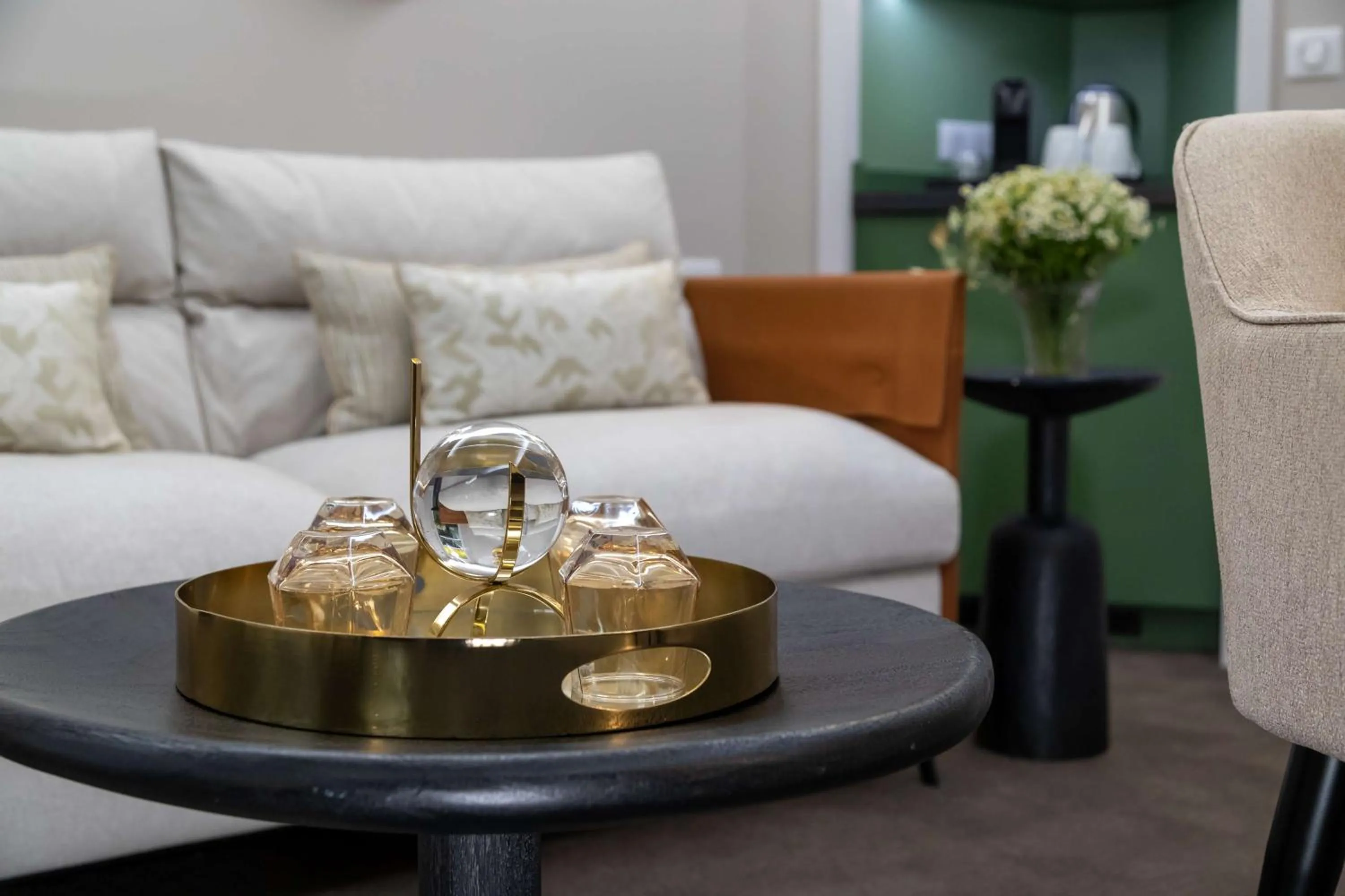 Living room in Hotel Camille Paris Tapestry Collection by Hilton