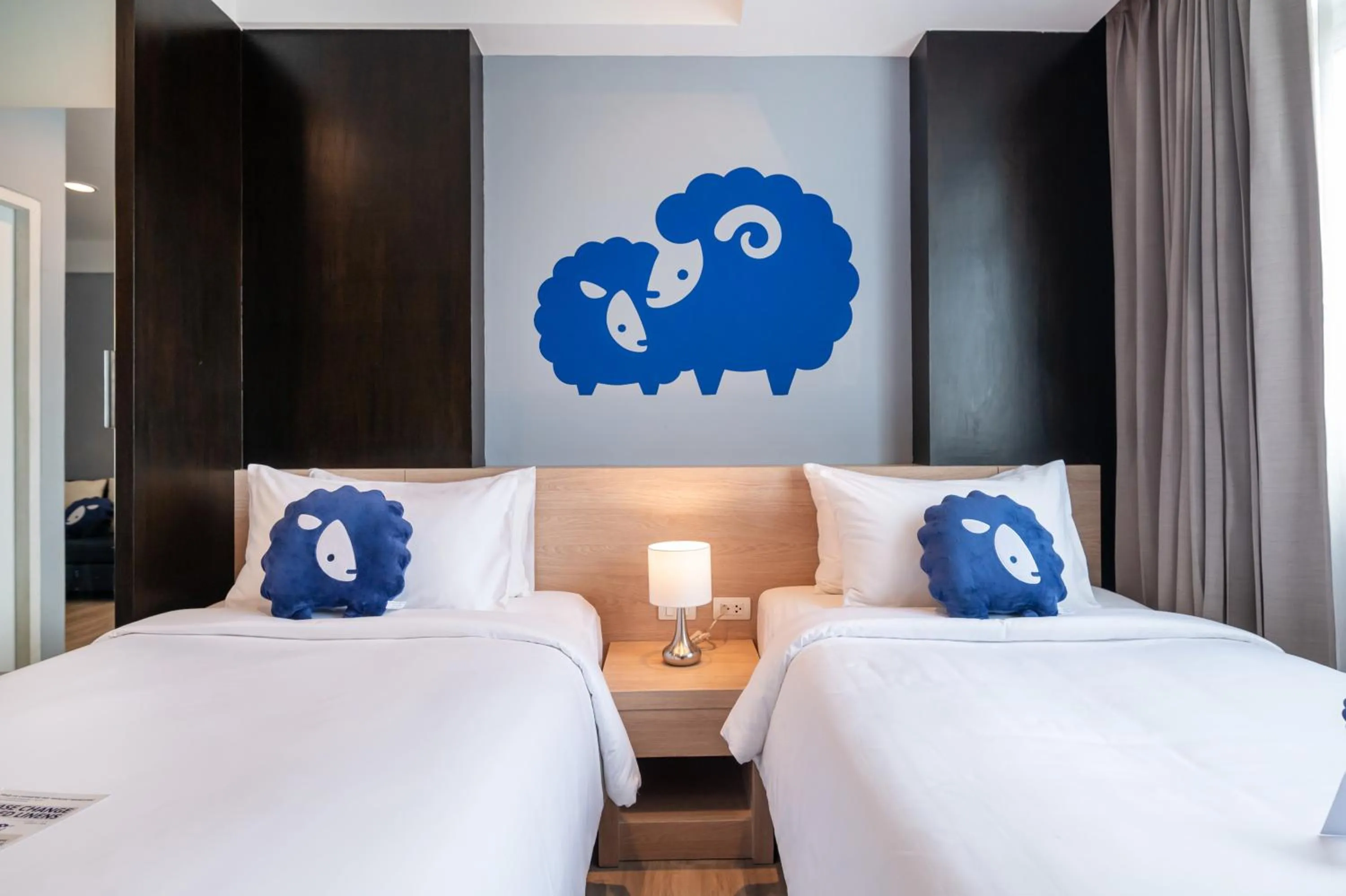 Bed in Kokotel Bangkok Dheva Thonglor