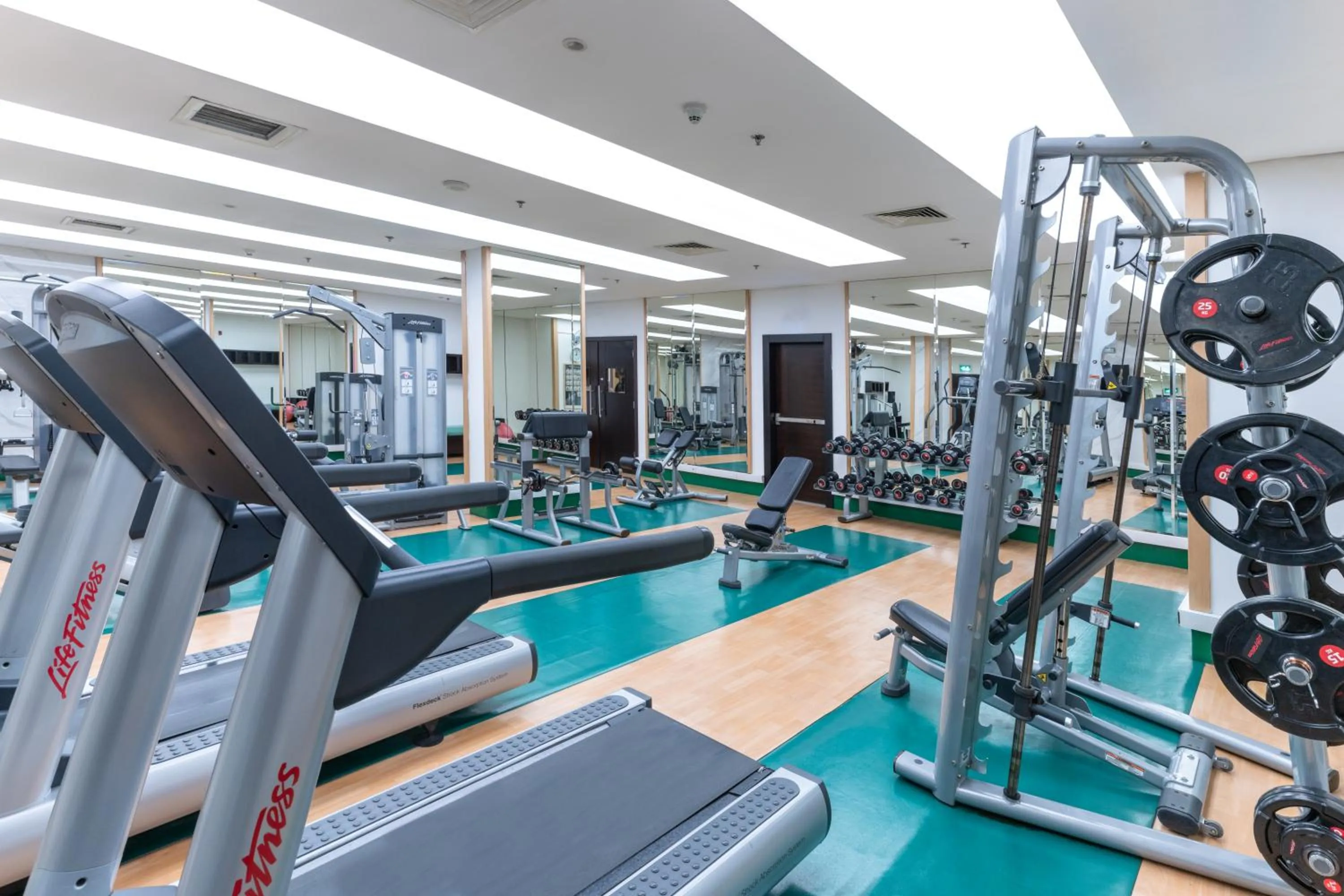 Fitness centre/facilities in Corp Amman Hotel