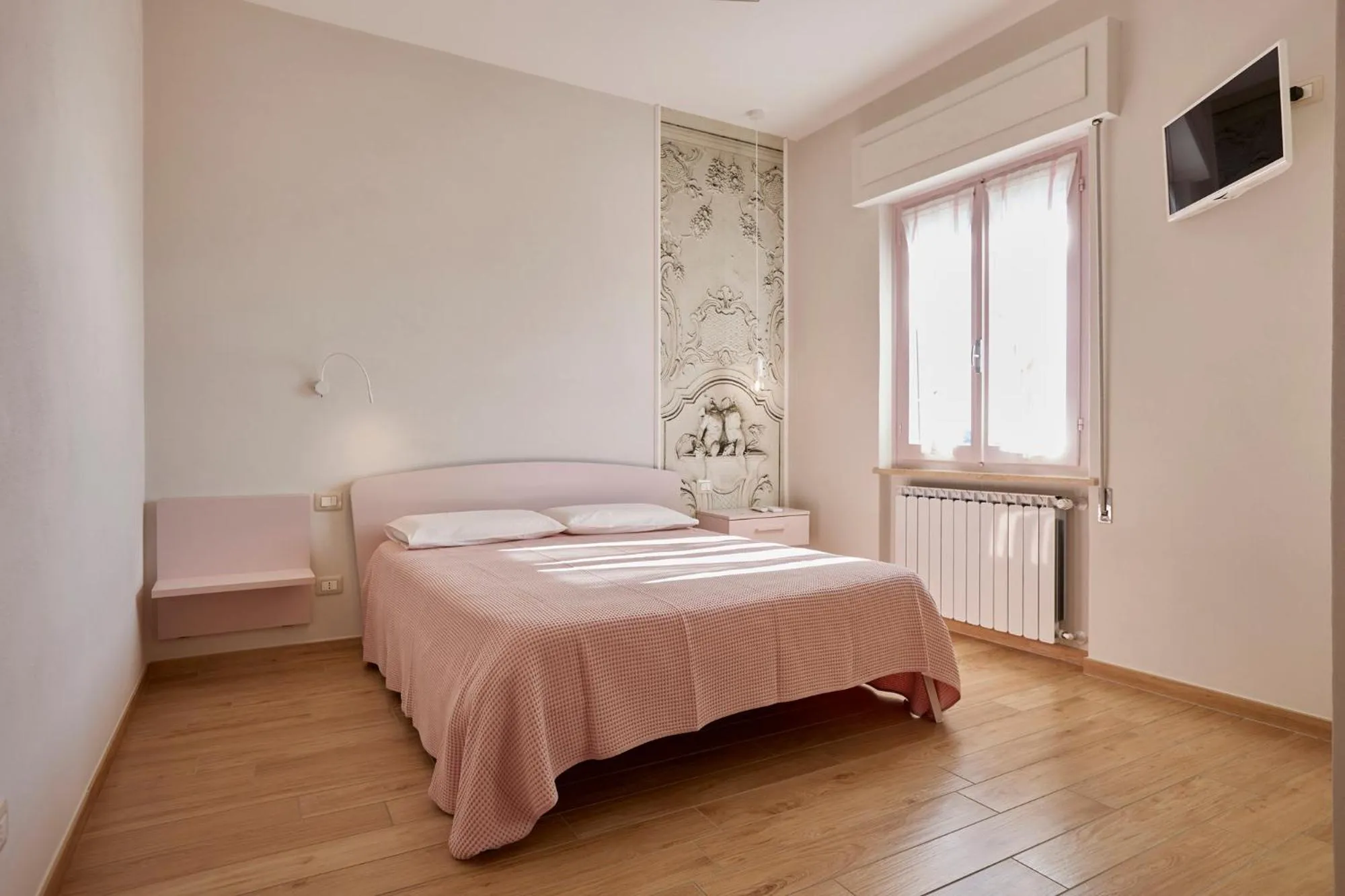 Bed in La Camelia Bianca B&B