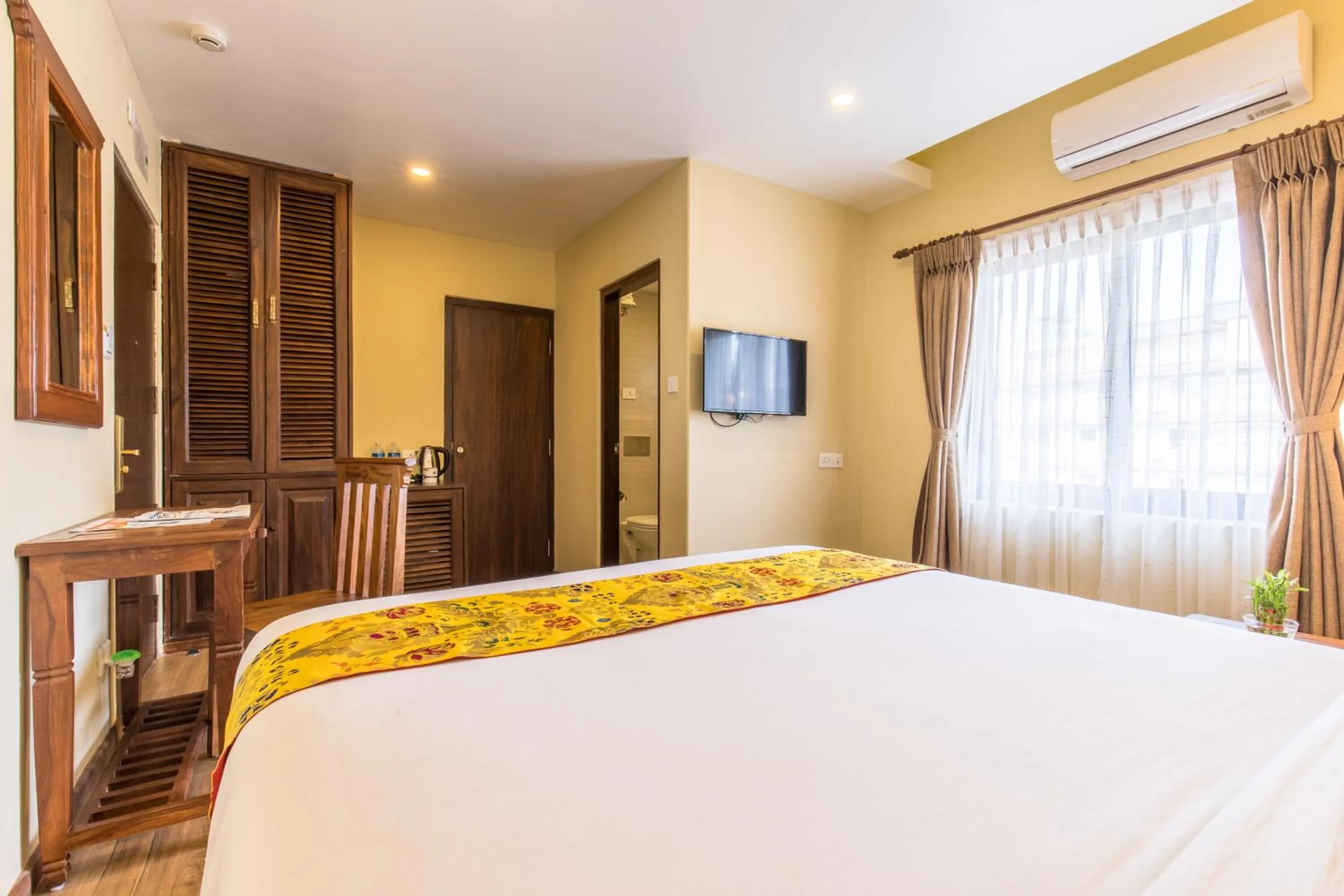 Bed in Hotel Mala Pokhara