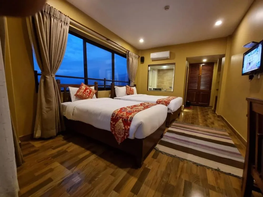 Bed in Hotel Mala Pokhara