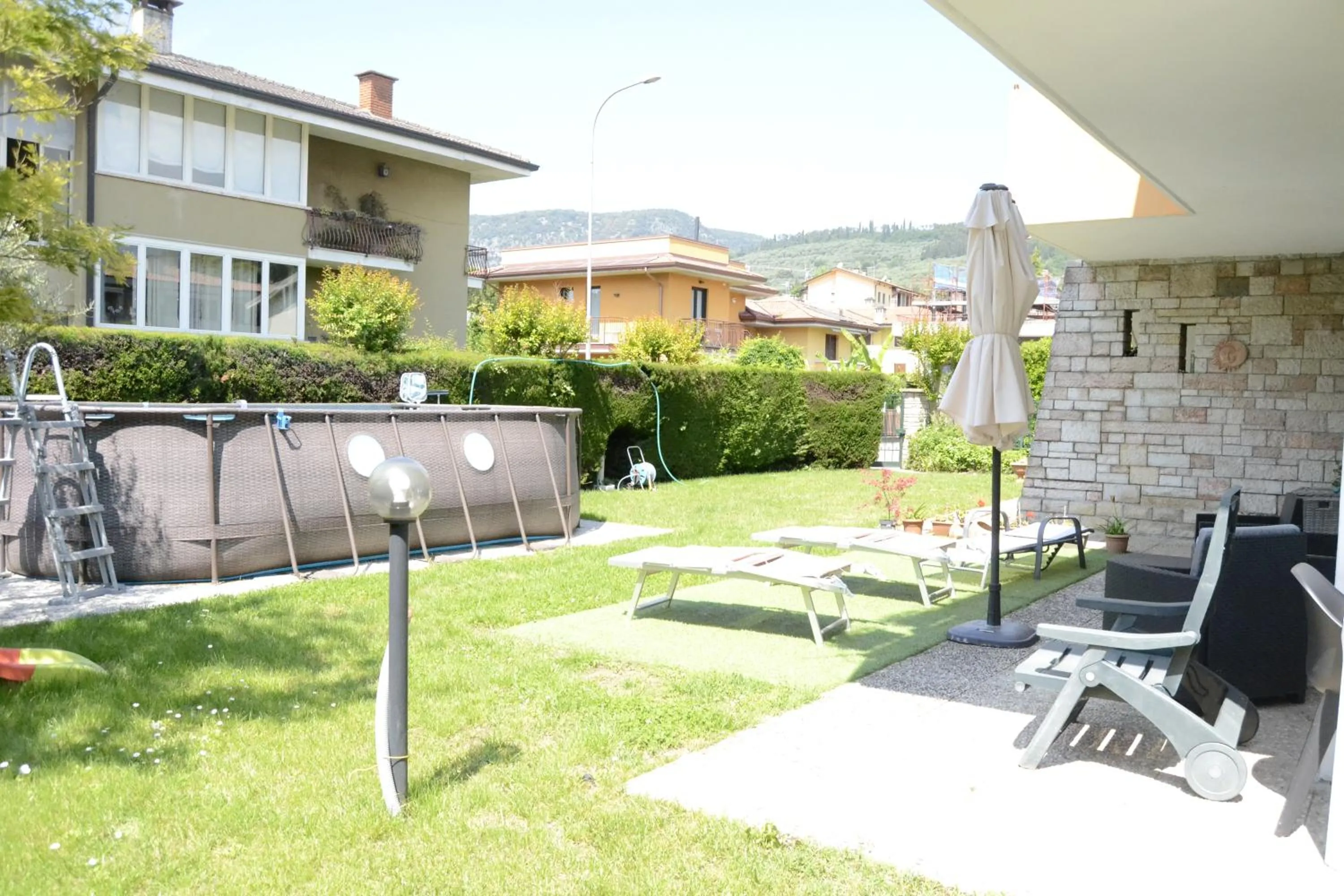 Swimming pool in Il Sole e la Luna B&B in Garda