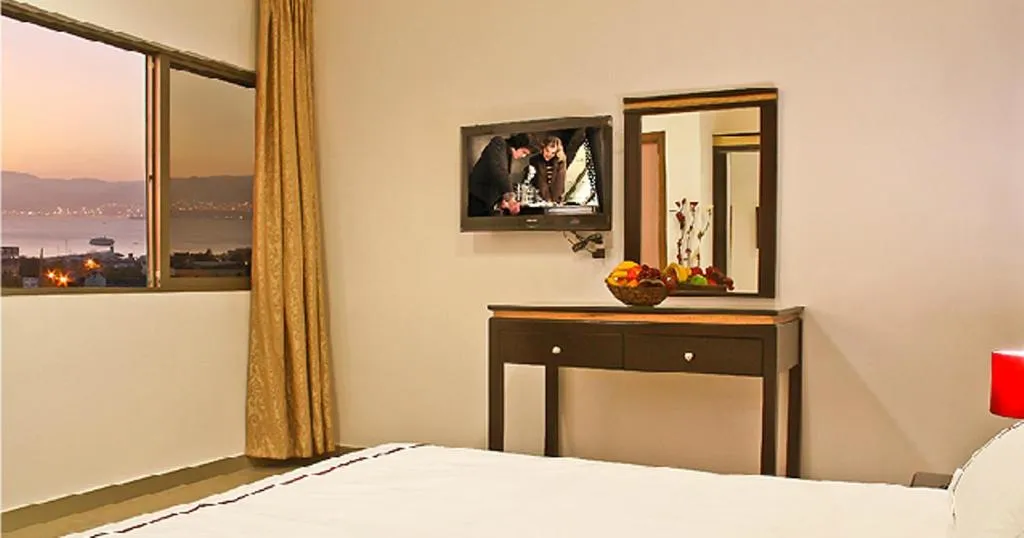 Bed in Golden Rose Hotel