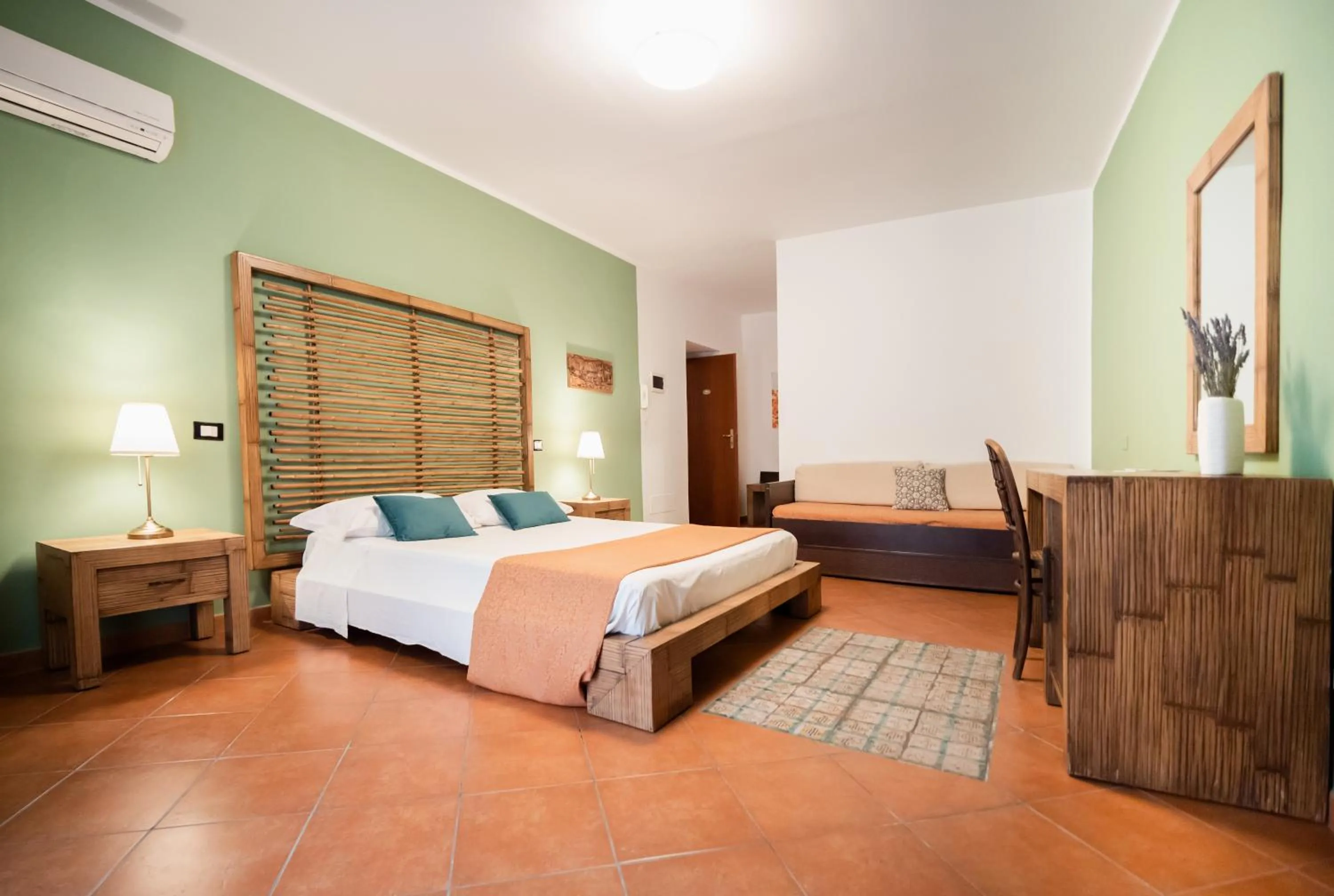 Bed in Kalamarina Rooms
