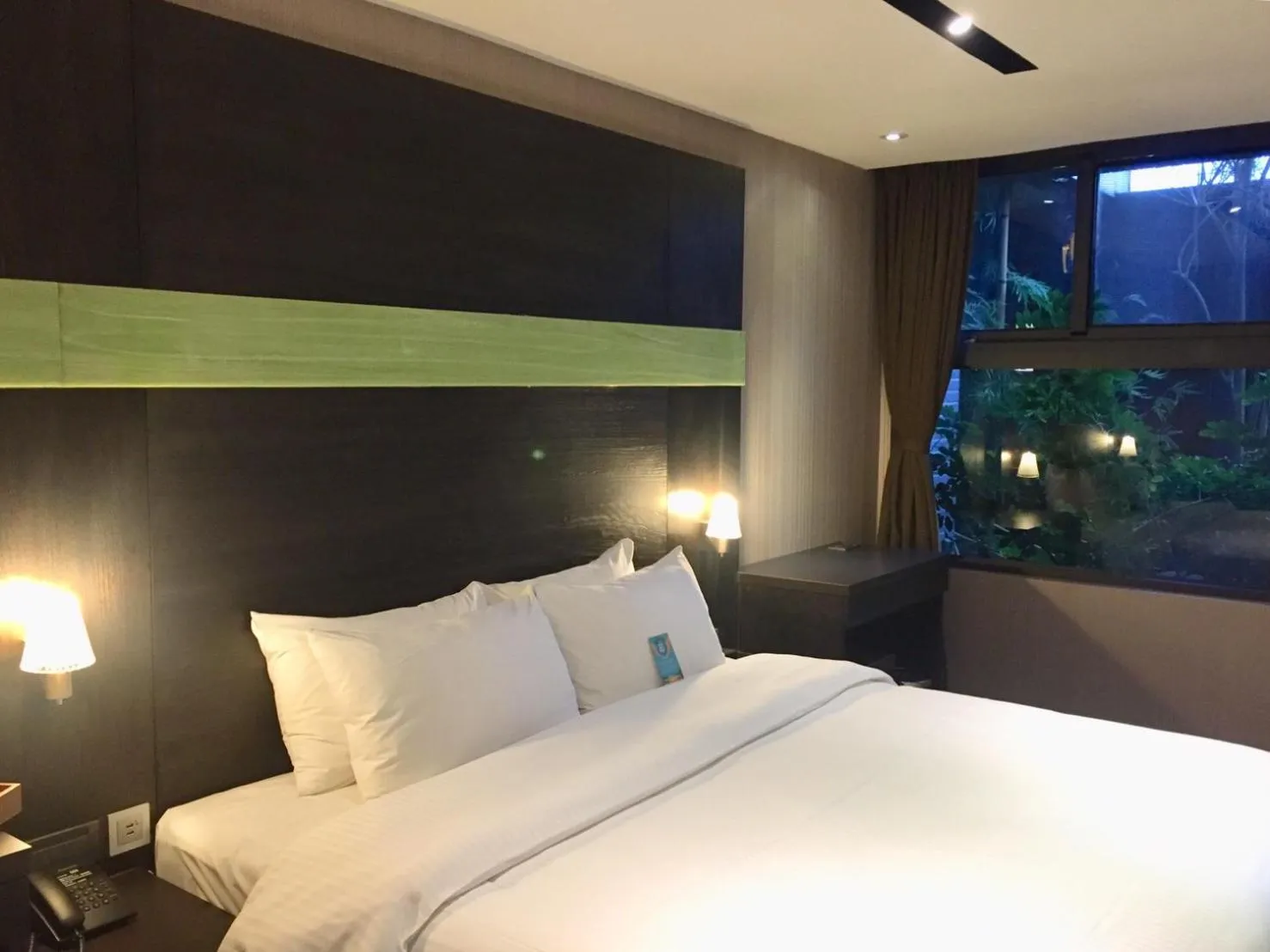 Photo of the whole room, Bed in Fengjia Hotel Bell