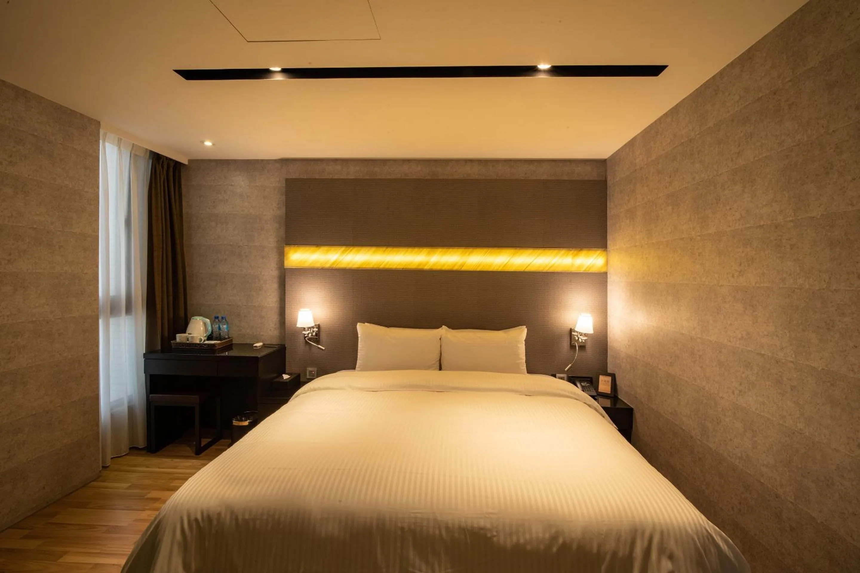 Bed in Fengjia Hotel Bell