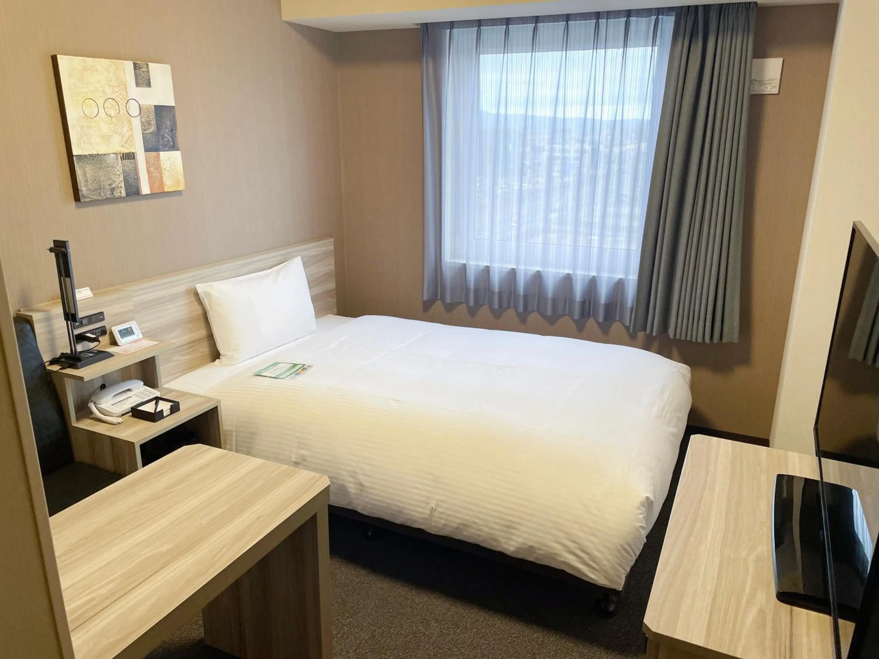 Photo of the whole room, Bed in Hotel Route-Inn Takefu Inter