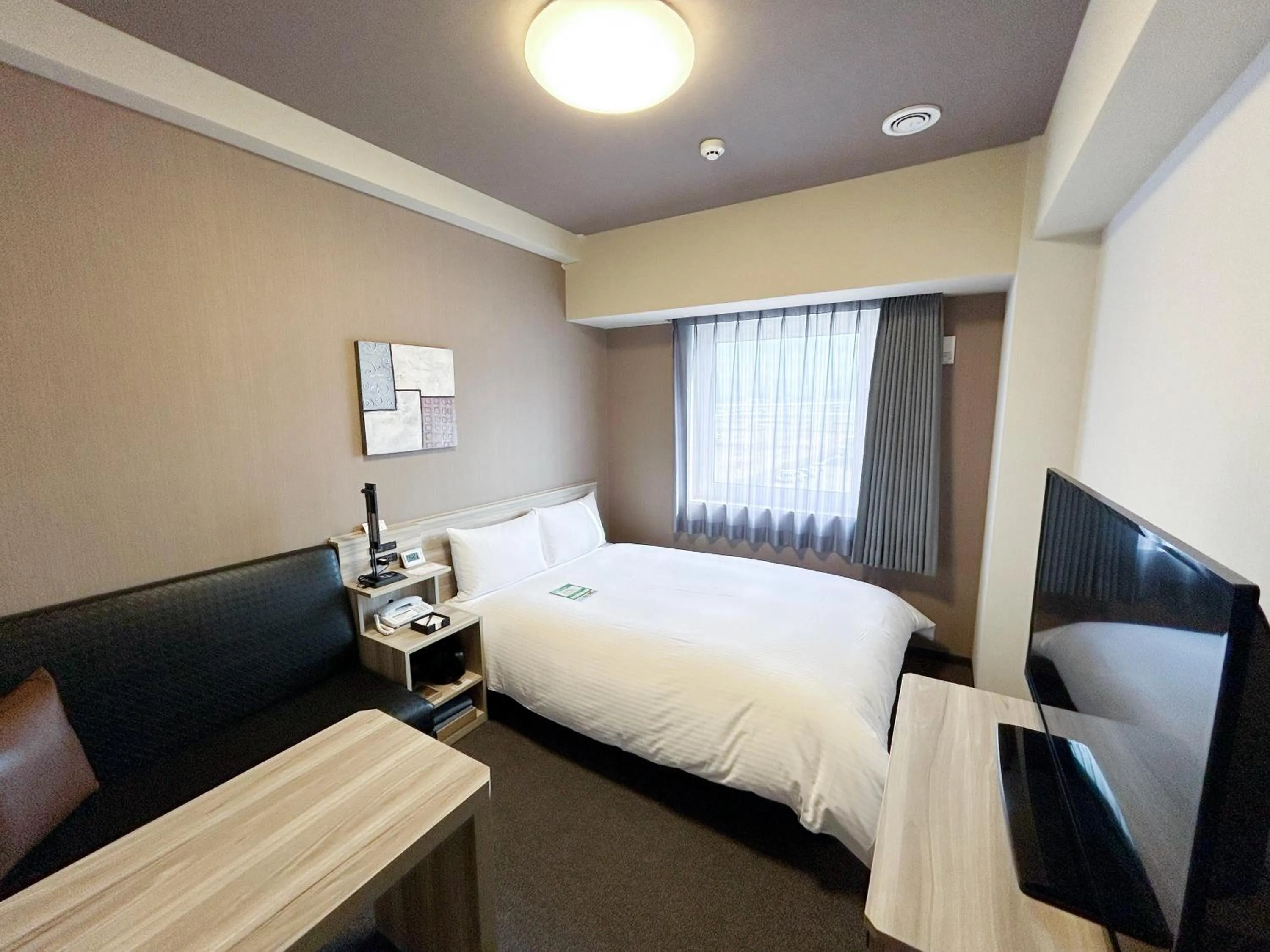 Photo of the whole room, Bed in Hotel Route-Inn Takefu Inter