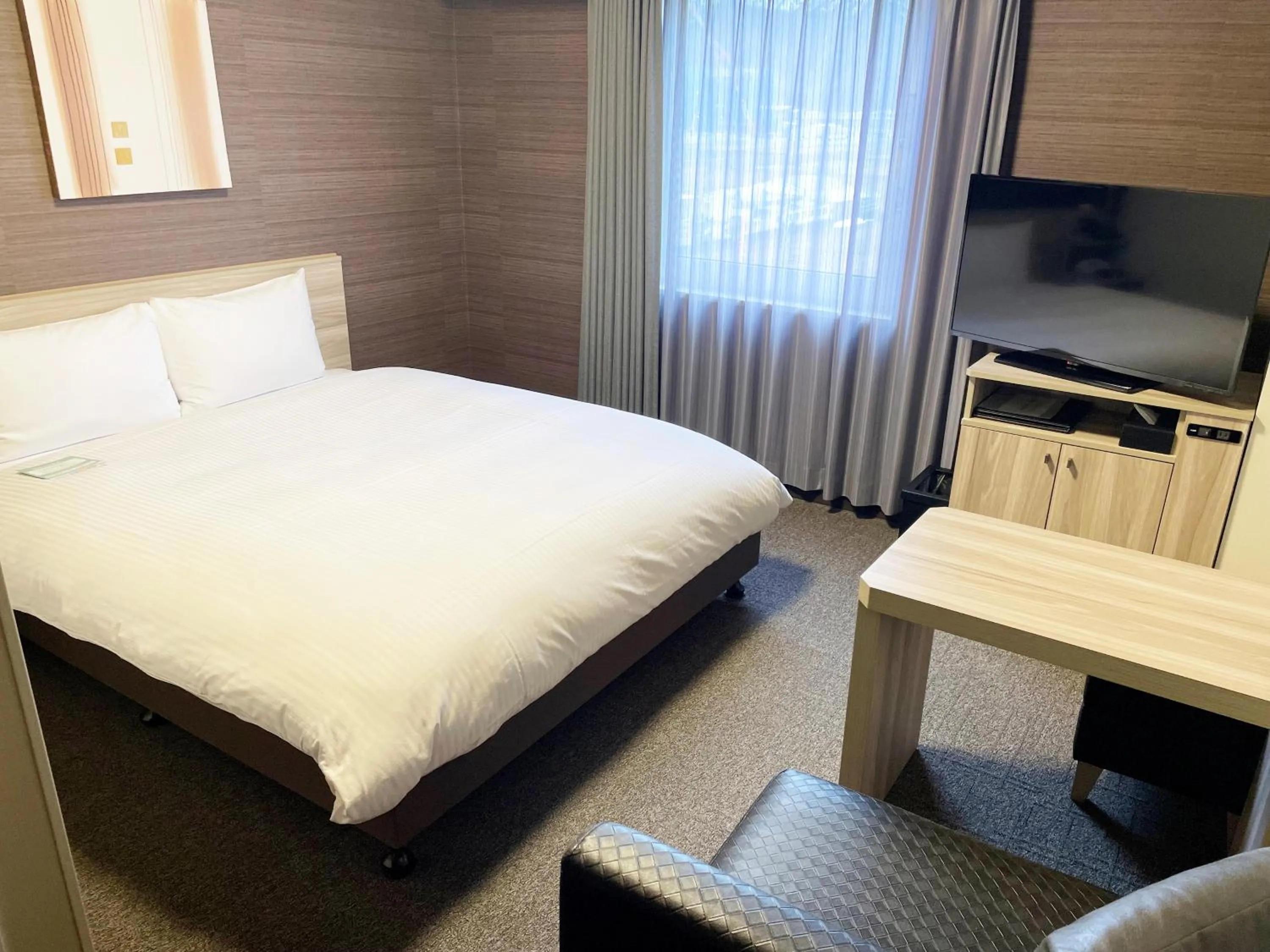 Photo of the whole room, Bed in Hotel Route-Inn Takefu Inter