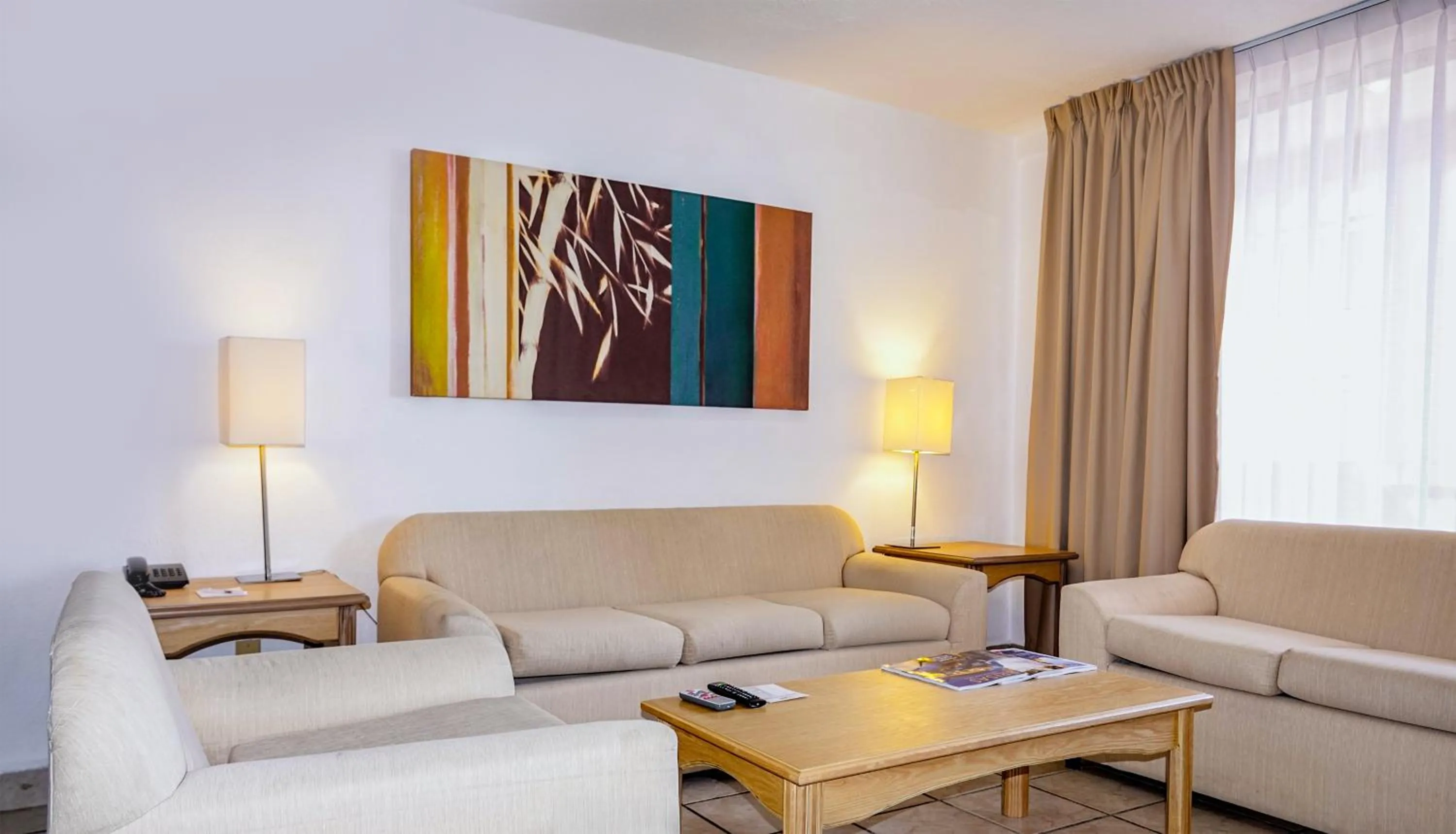 Living room in Sunrock Hotel & Suites