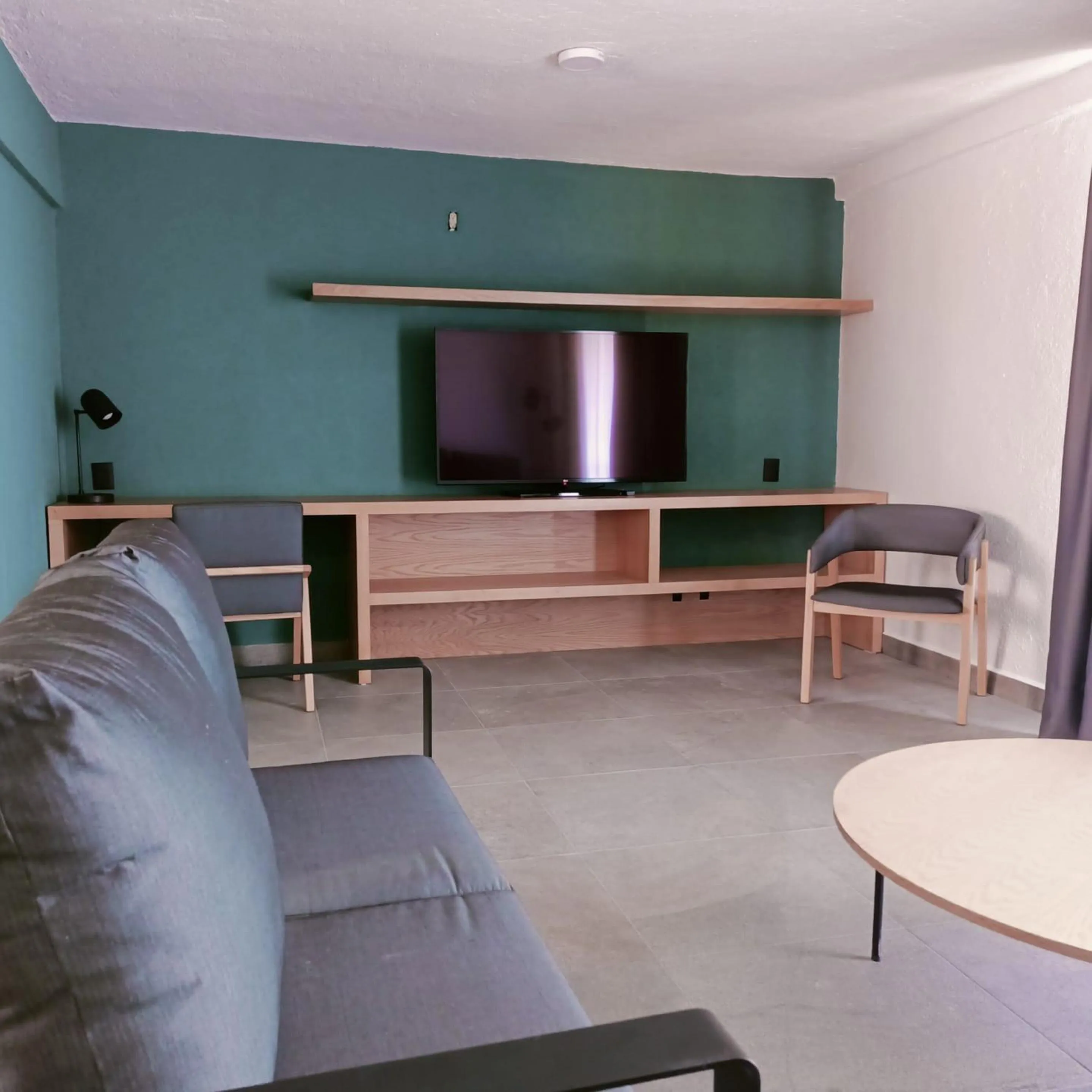 Living room in Sunrock Hotel & Suites