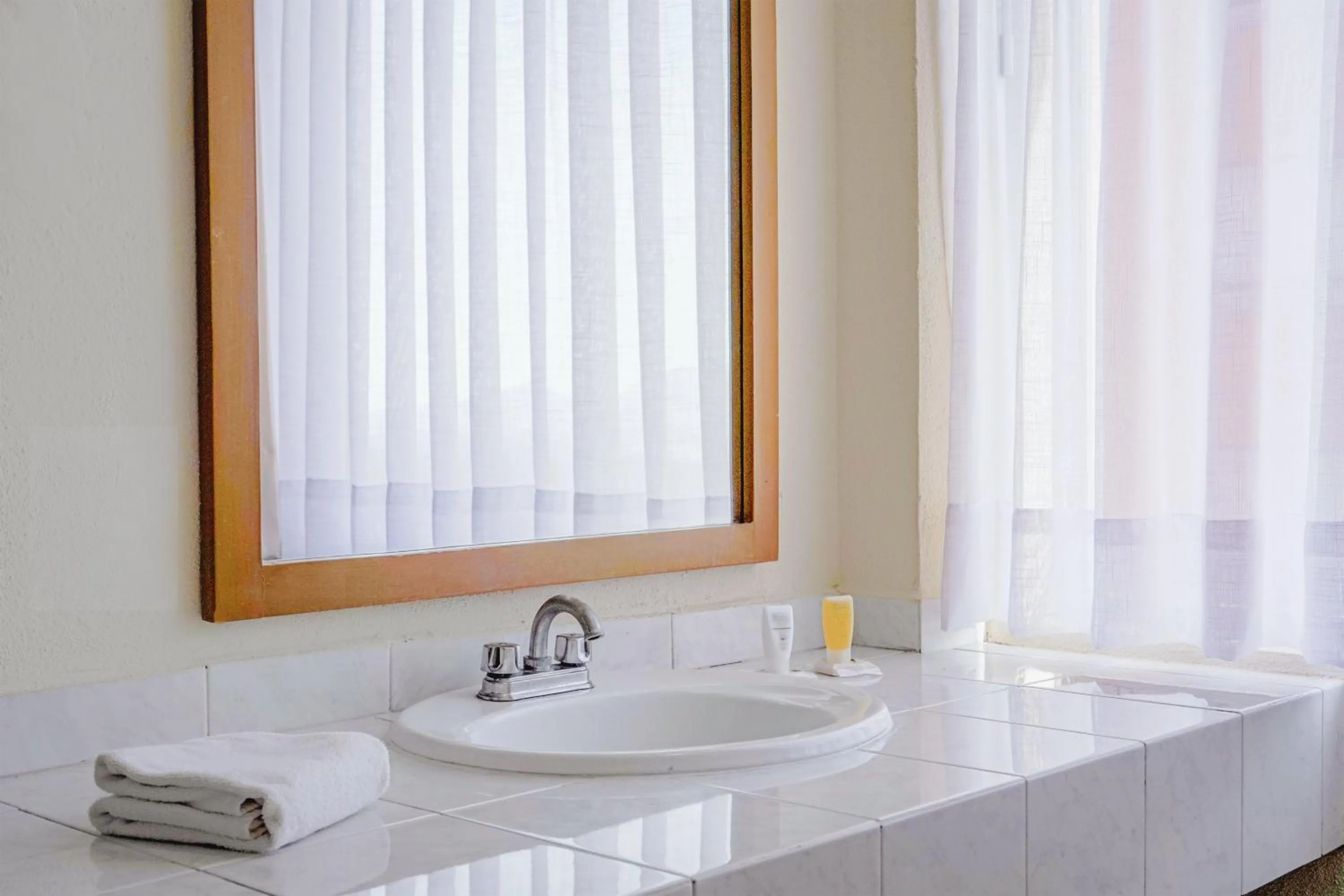 Bathroom in Sunrock Hotel & Suites