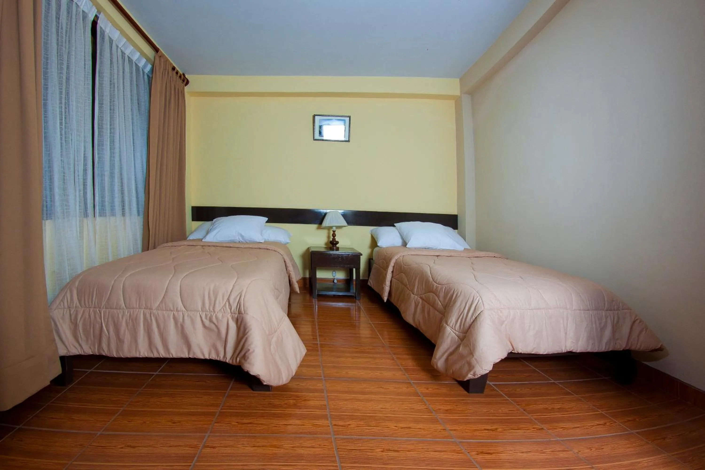 Bedroom in Yucay Plaza Inn